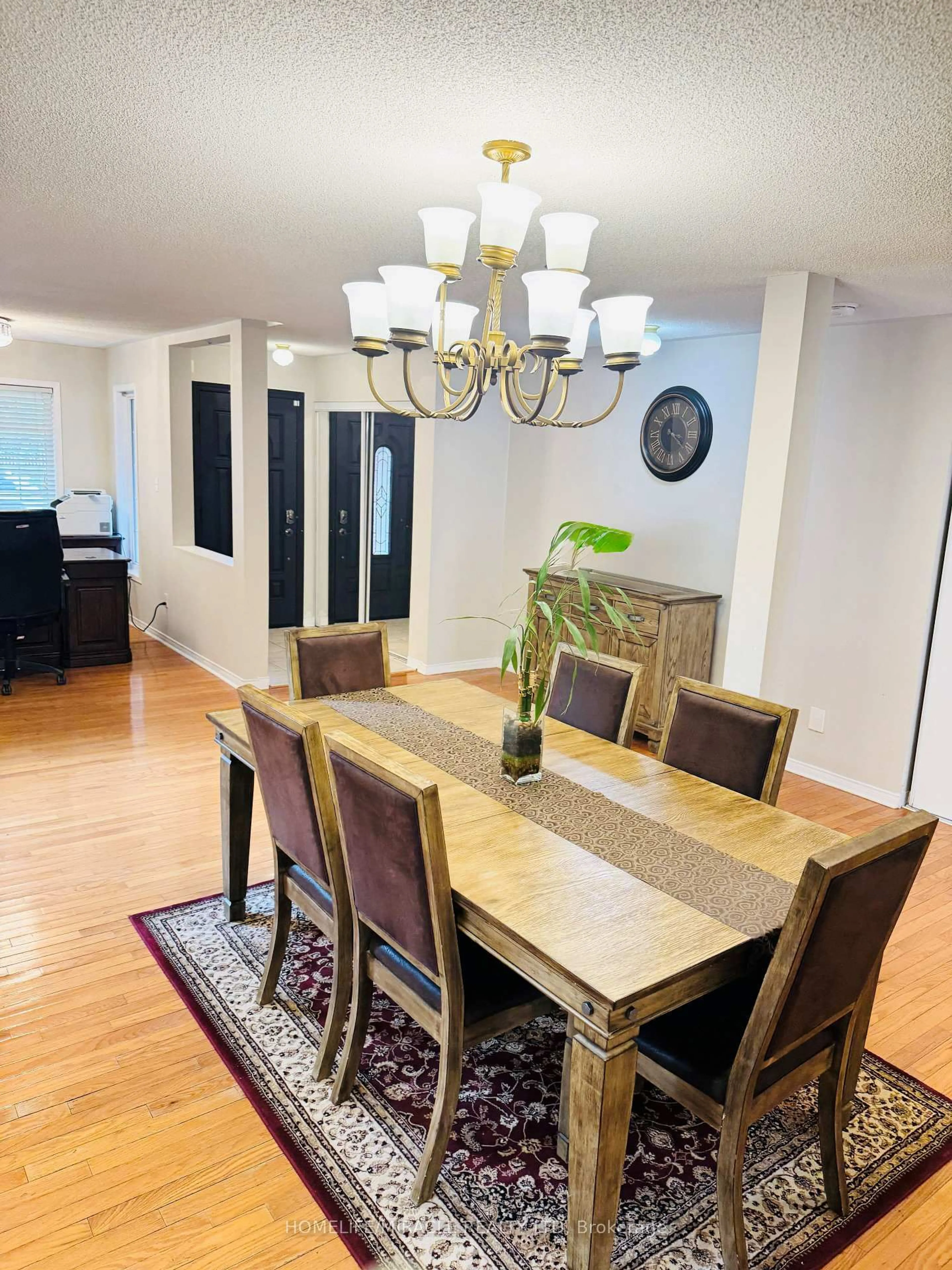 Dining room, wood/laminate floor for 65 Fairhill Ave, Brampton Ontario L7A 2E8