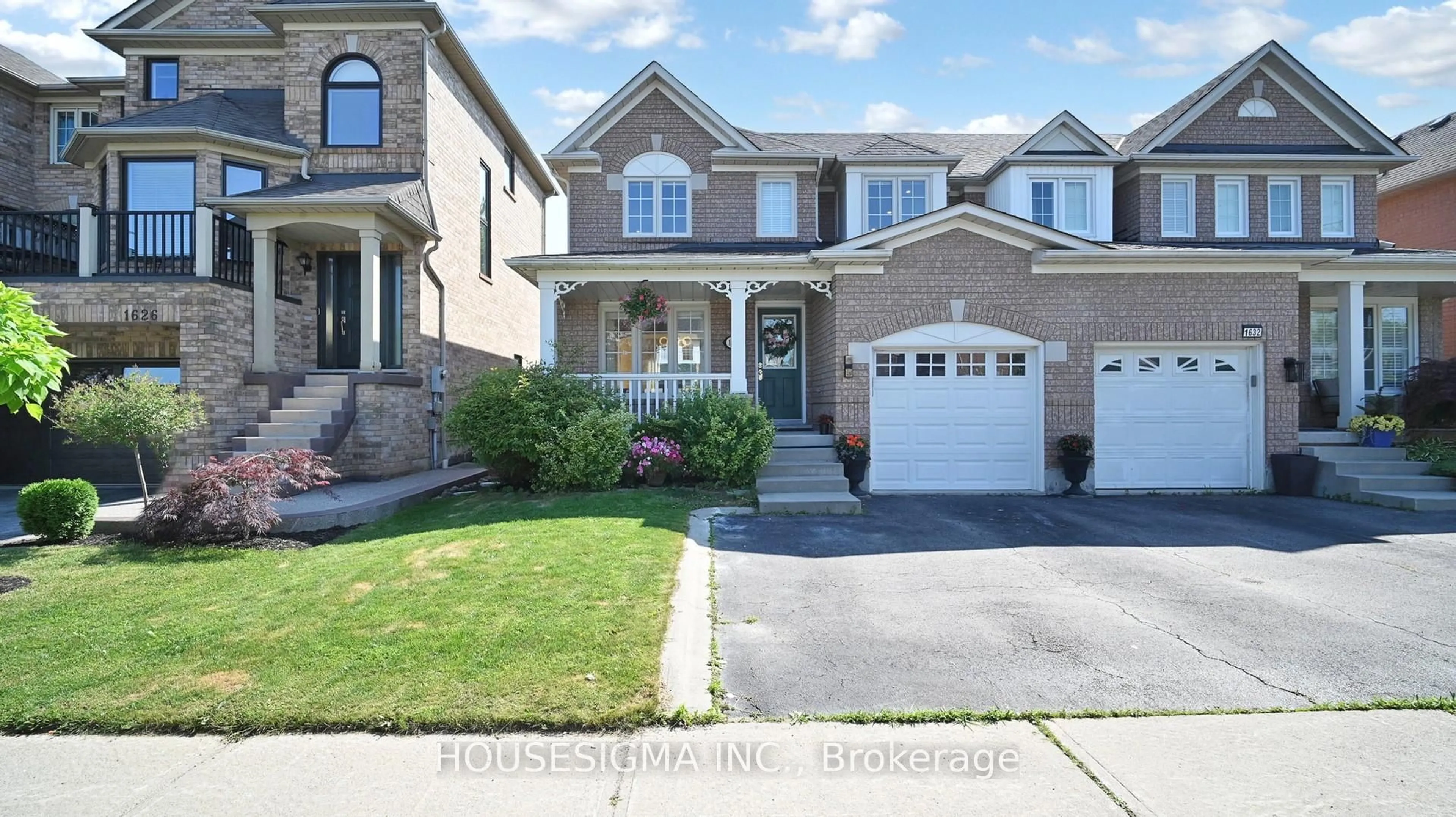Home with brick exterior material, street for 1630 Samuelson Circ, Mississauga Ontario L5N 7Z7