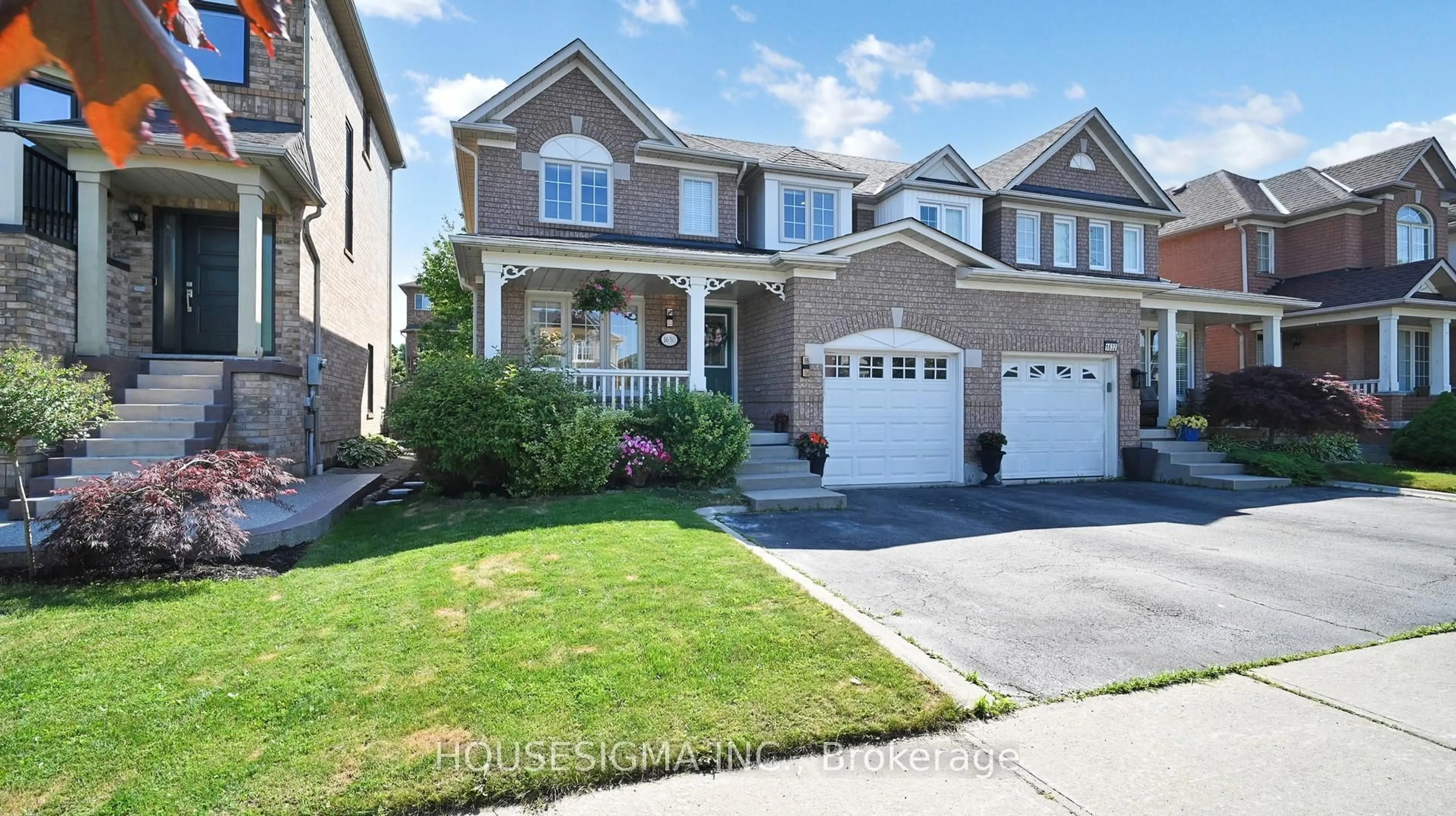 Home with brick exterior material, street for 1630 Samuelson Circ, Mississauga Ontario L5N 7Z7