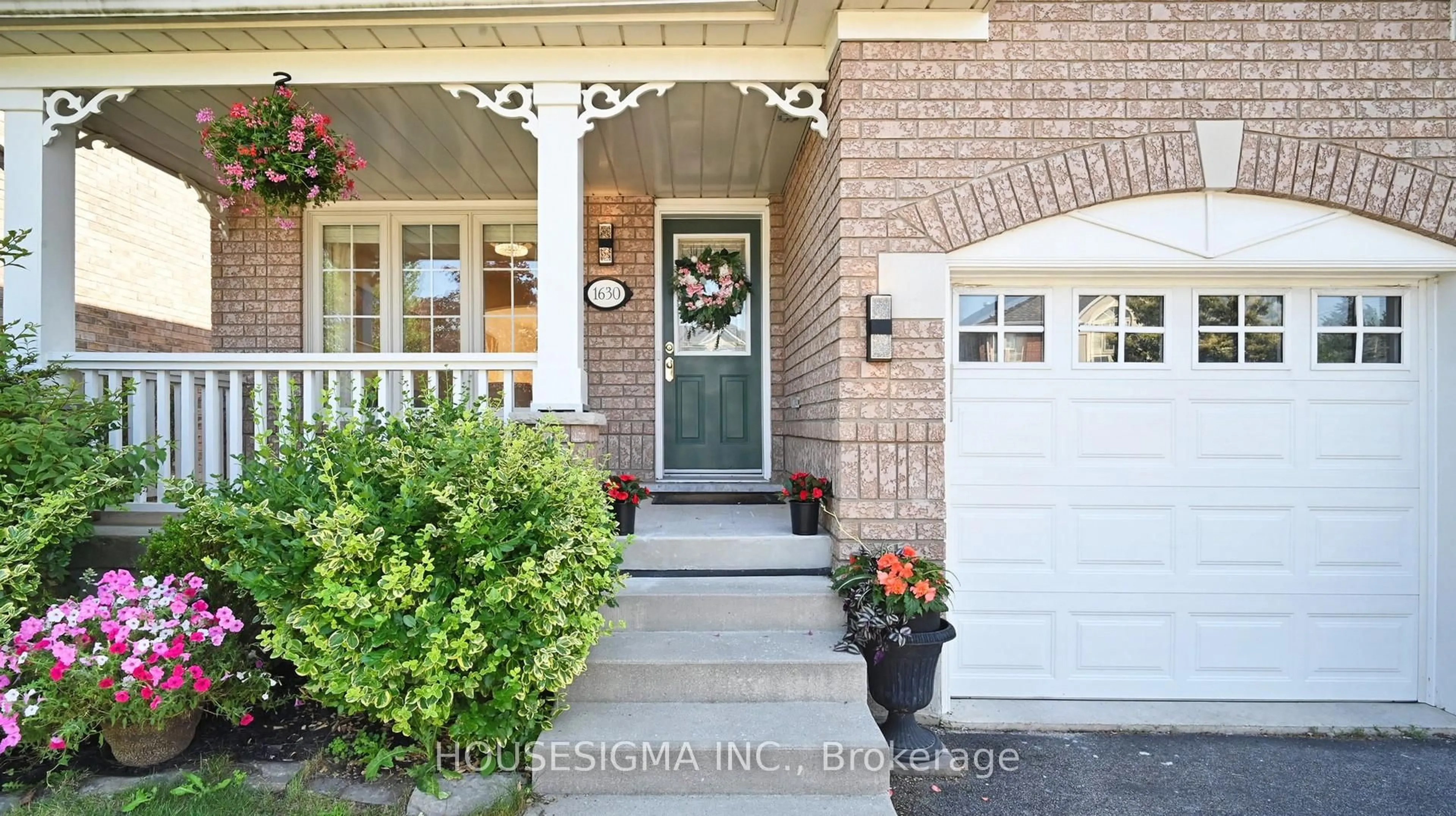 Home with brick exterior material, street for 1630 Samuelson Circ, Mississauga Ontario L5N 7Z7