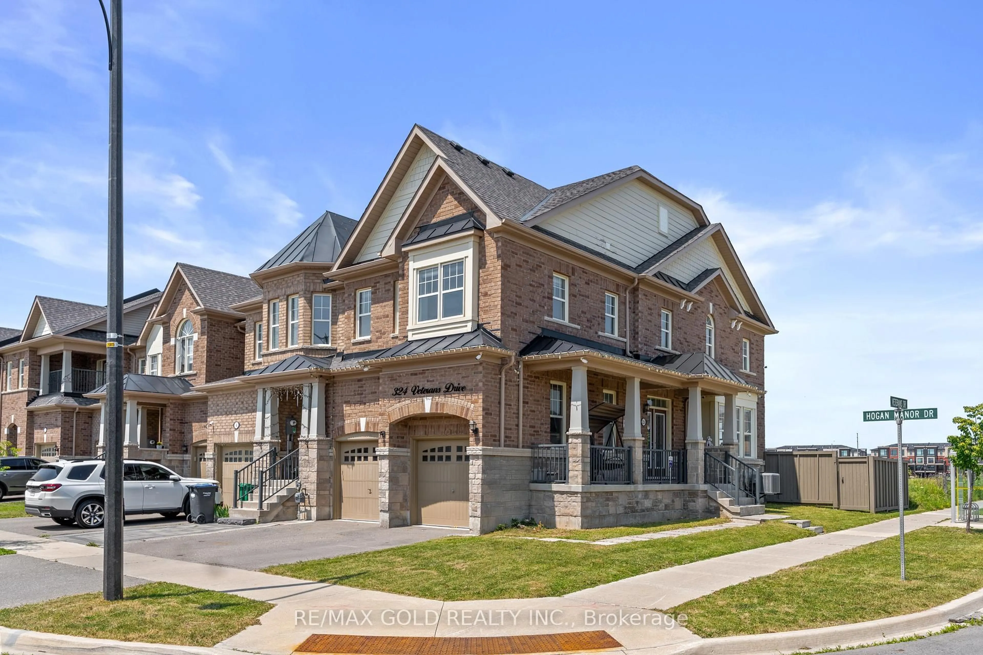 Home with brick exterior material, street for 324 Veterans Dr, Brampton Ontario L7A 0B2