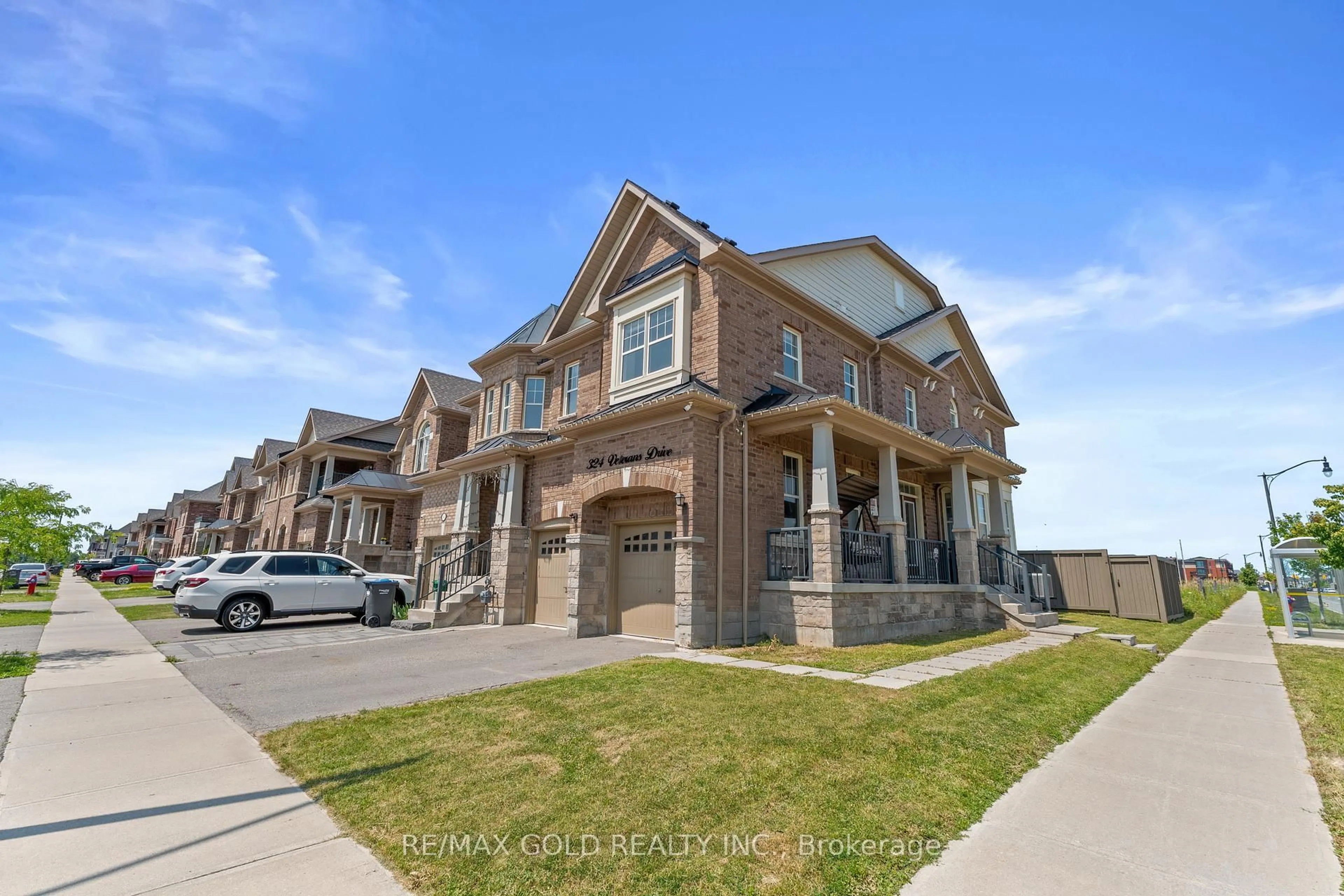 Home with brick exterior material, street for 324 Veterans Dr, Brampton Ontario L7A 0B2