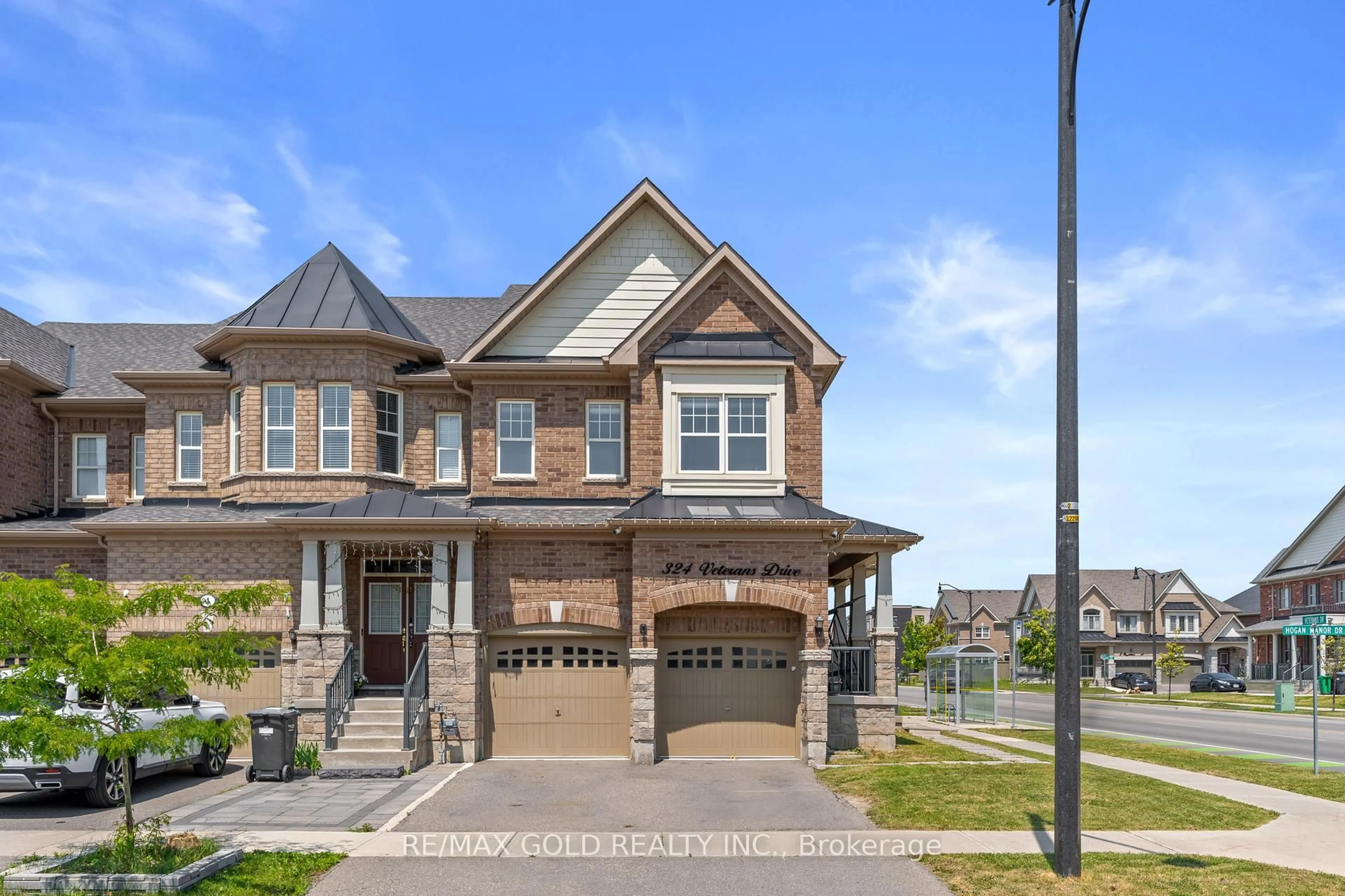 Home with brick exterior material, street for 324 Veterans Dr, Brampton Ontario L7A 0B2