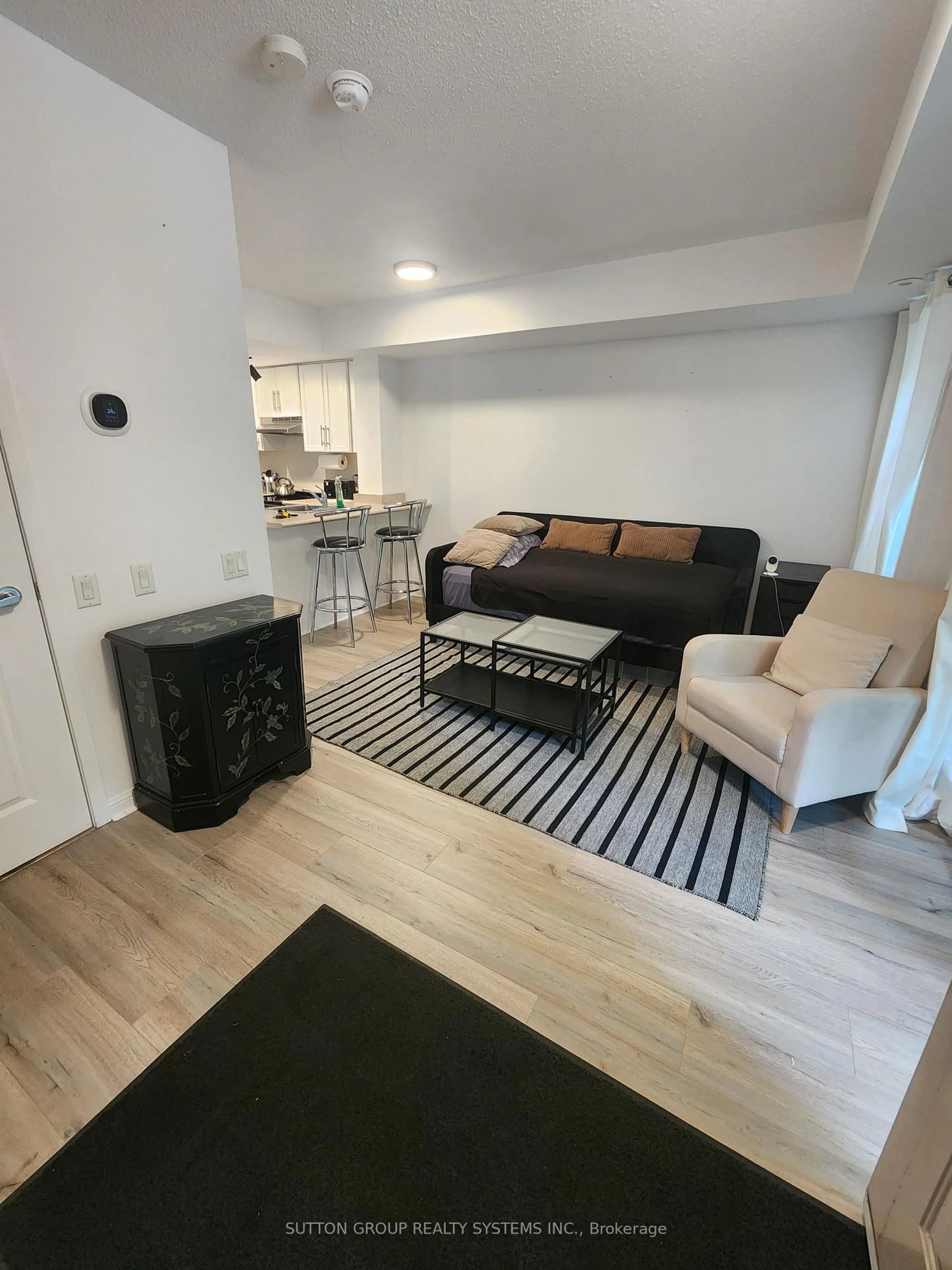 Living room with furniture, unknown for 93 The Queensway #TH20, Toronto Ontario M6S 5A7
