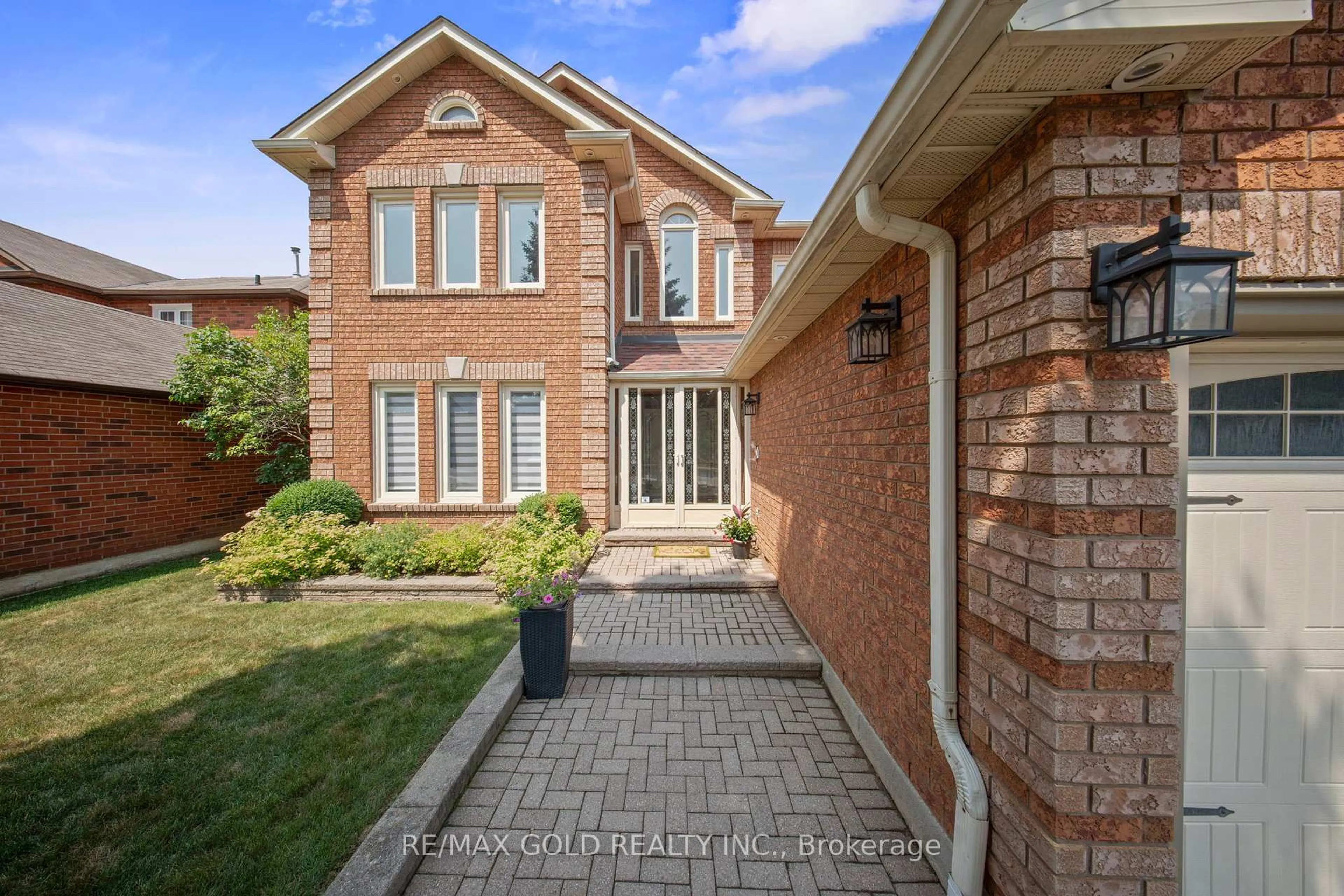 Home with brick exterior material, street for 103 Kenpark Ave, Brampton Ontario L6Z 3K5