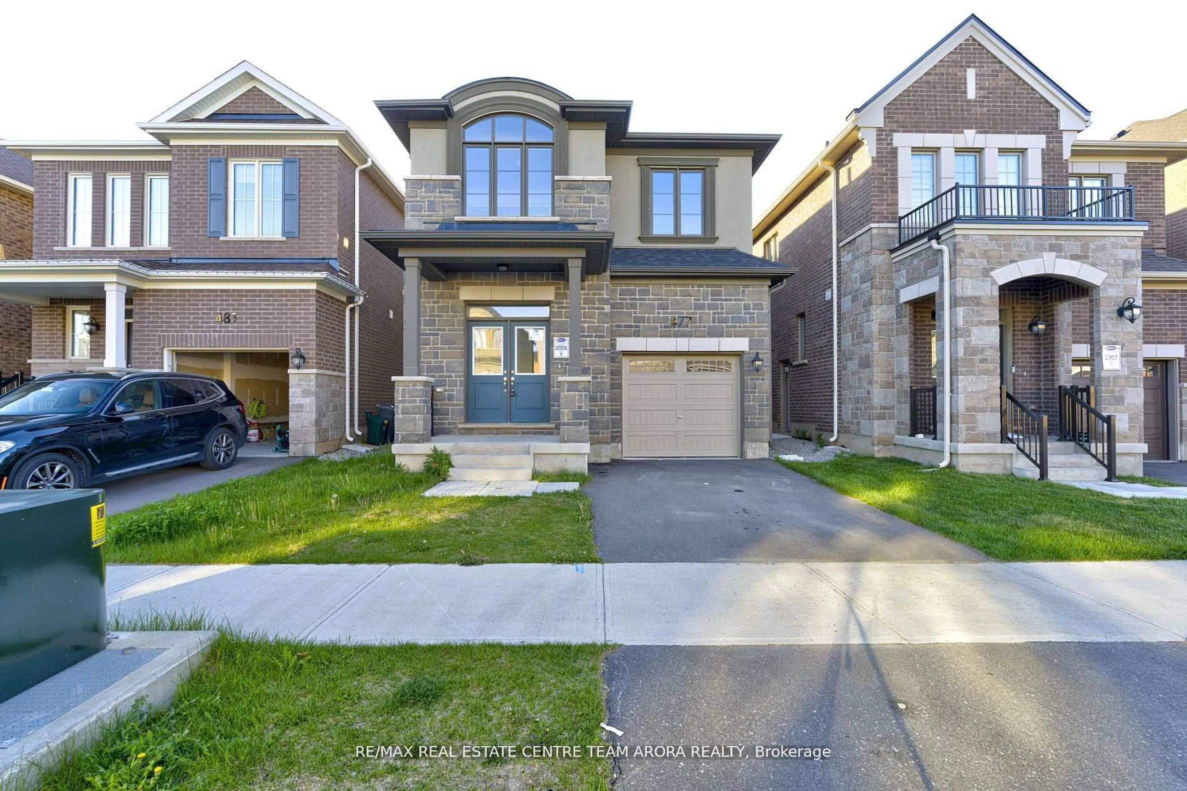 Home with brick exterior material, street for 477 Boyd Lane, Milton Ontario L9E 1X2