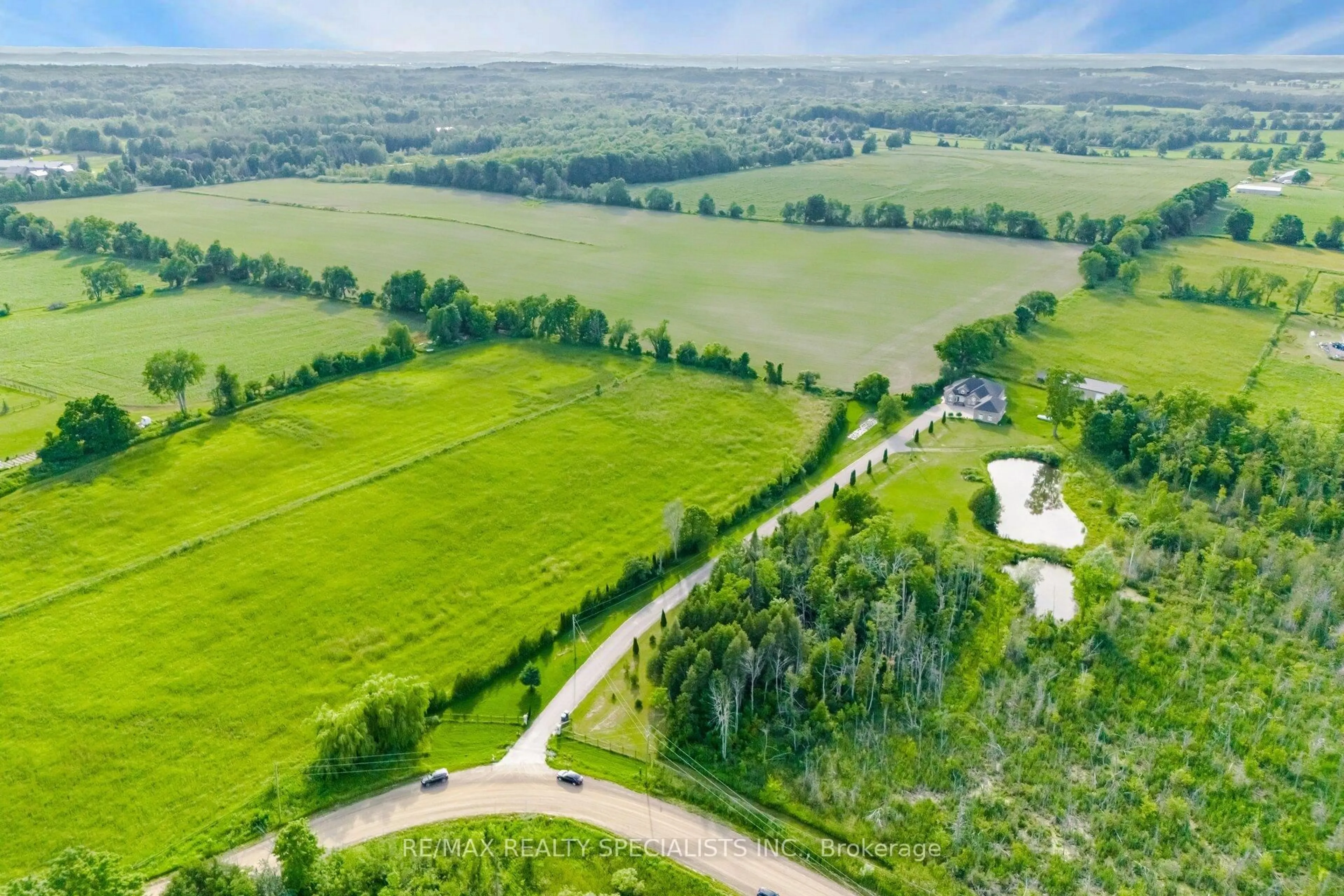 A pic from outside/outdoor area/front of a property/back of a property/a pic from drone, forest/trees view for 5246 Beech Grove Sdrd, Caledon Ontario L7K 2G1