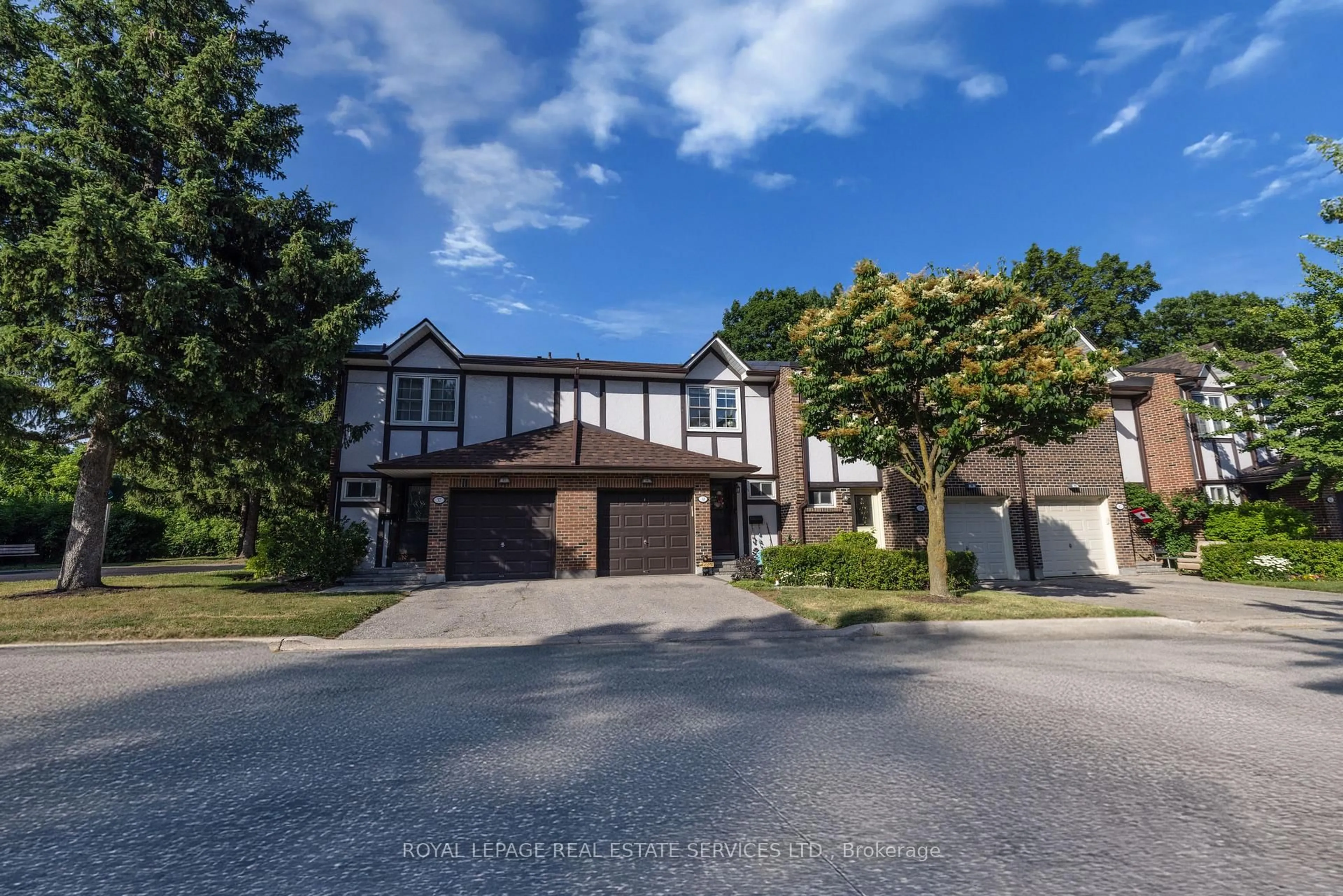 A pic from outside/outdoor area/front of a property/back of a property/a pic from drone, street for 2120 Rathburn Rd #38, Mississauga Ontario L4W 2S8