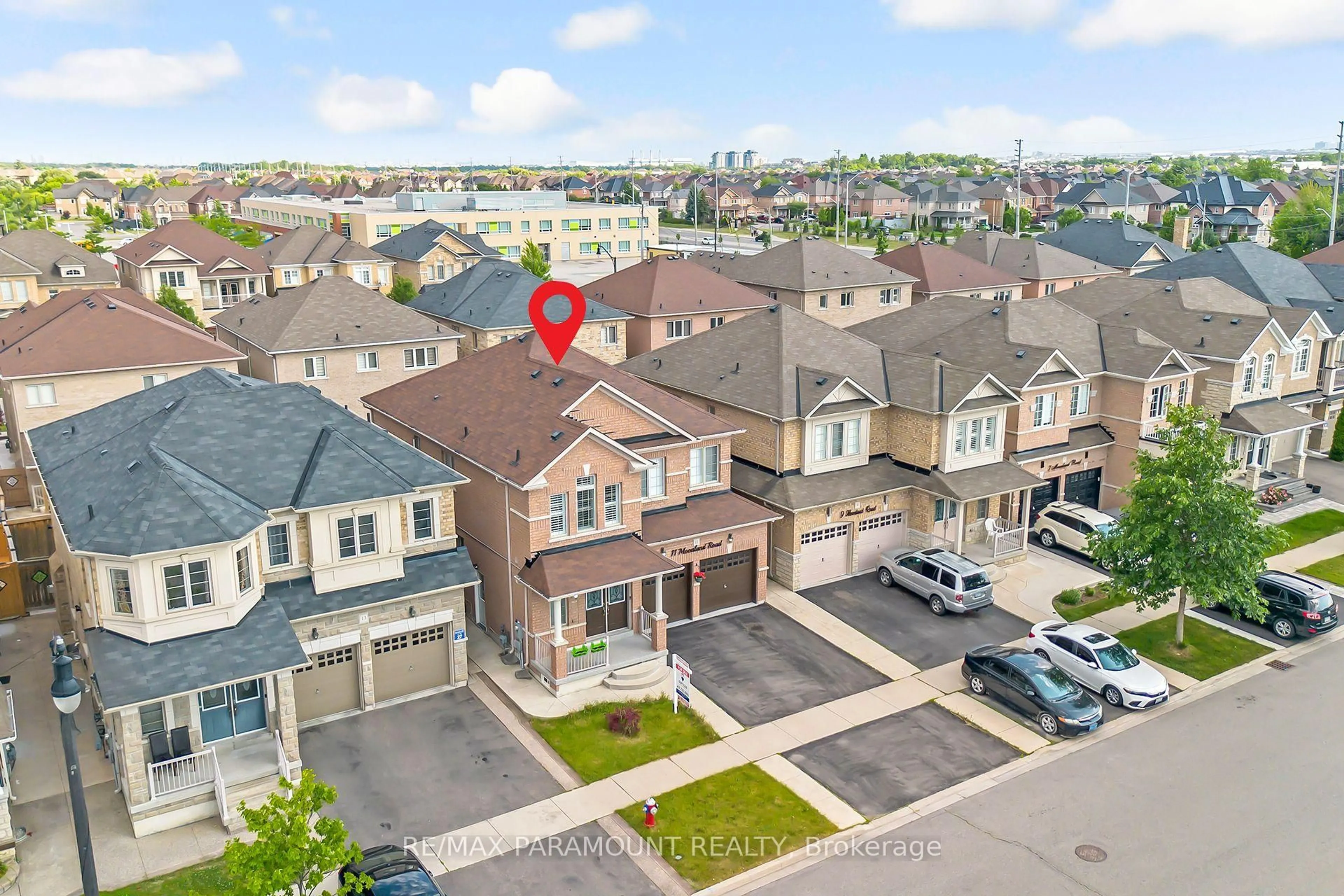 A pic from outside/outdoor area/front of a property/back of a property/a pic from drone, street for 11 Moonland Rd, Brampton Ontario L6P 3Y1