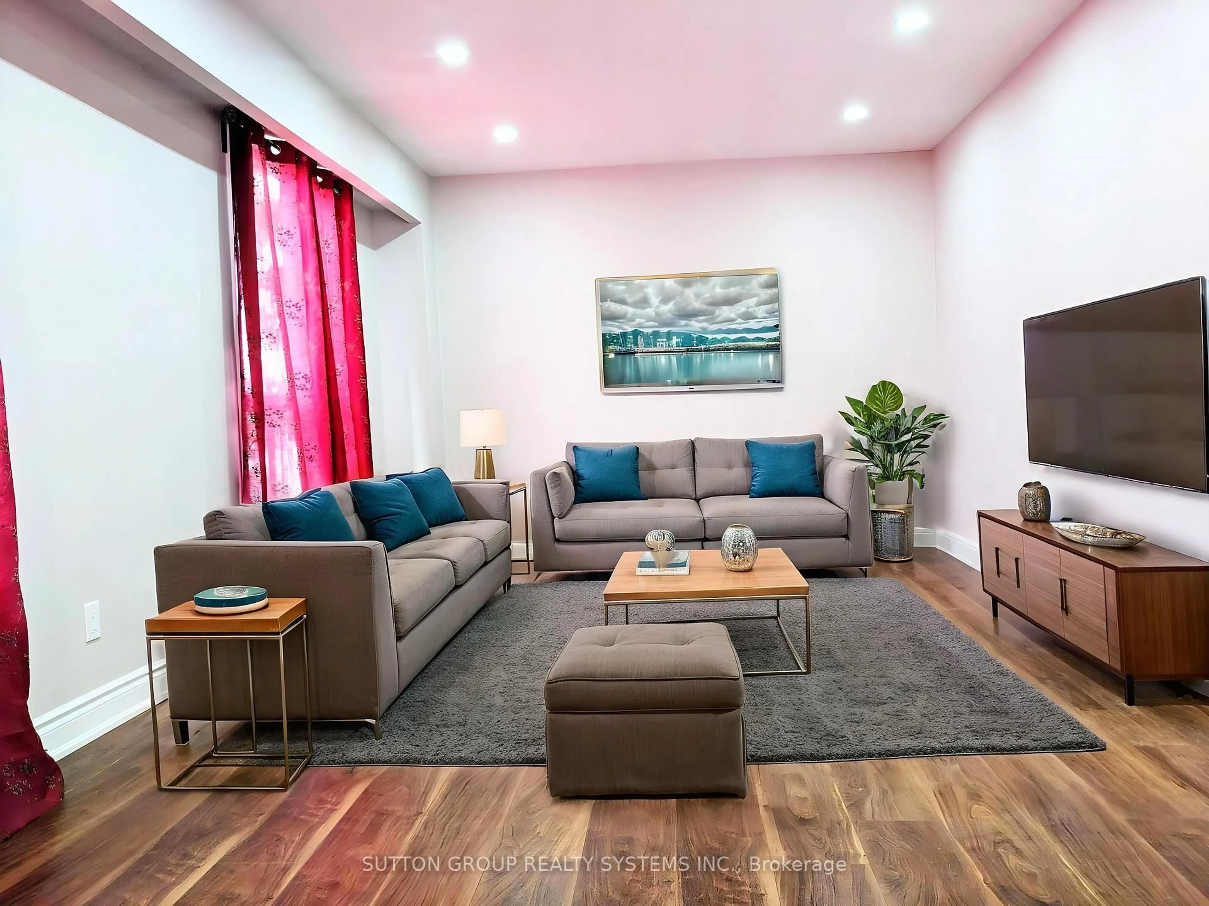 Living room with furniture, wood/laminate floor for 33 Earlsdale Cres, Brampton Ontario L6T 3A7