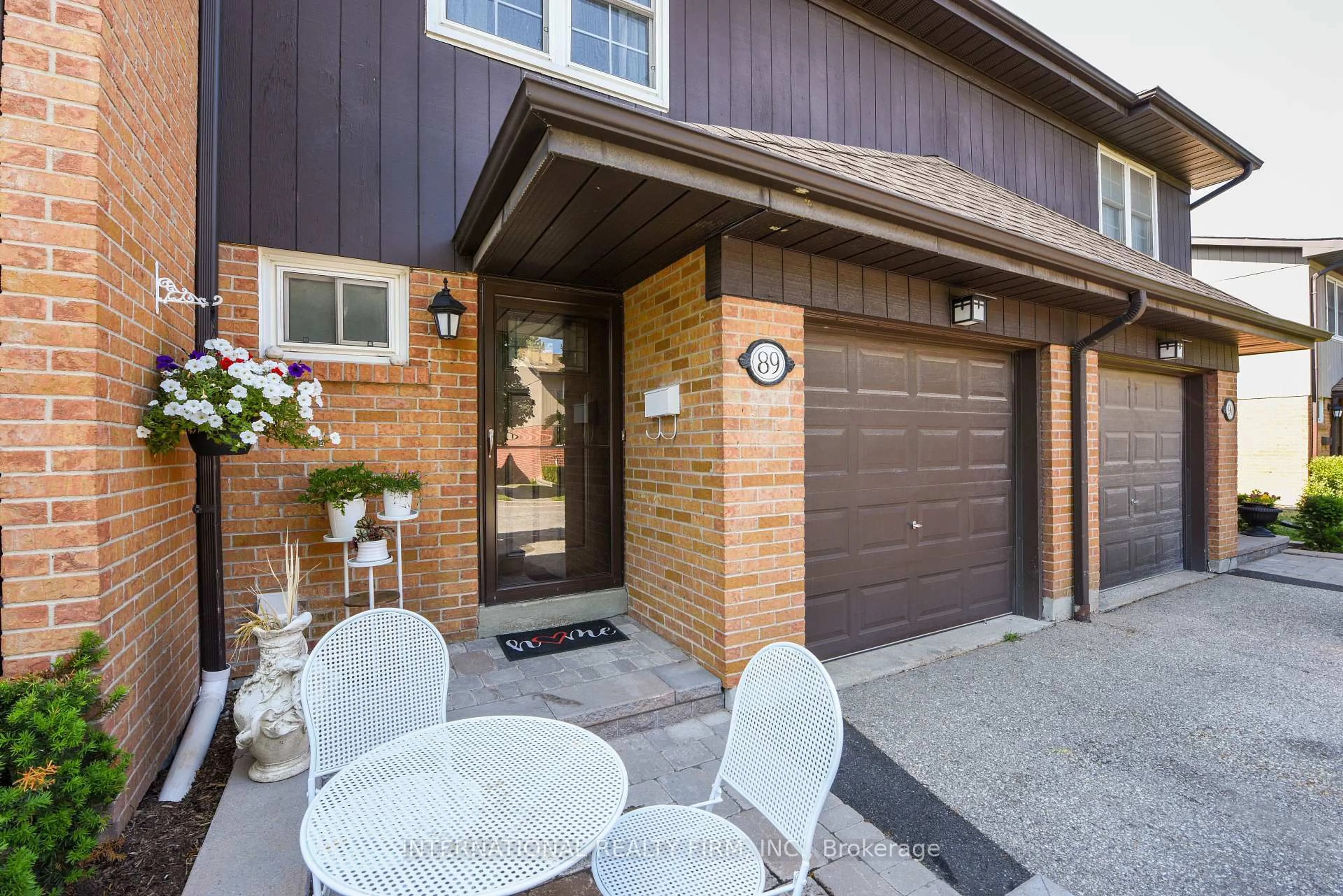 Home with brick exterior material, street for 1951 Rathburn Rd #89, Mississauga Ontario L4W 2N9