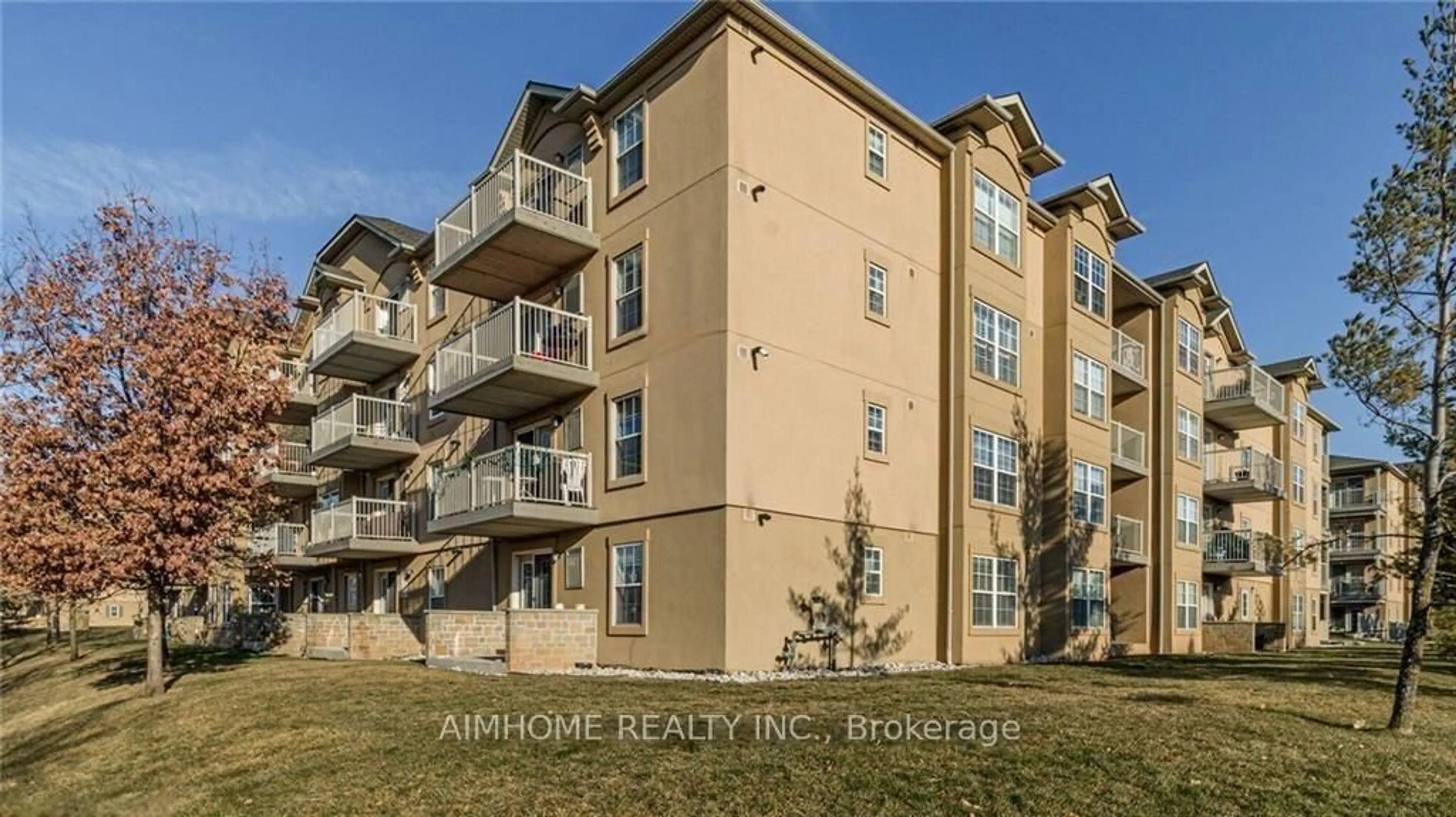 A pic from outside/outdoor area/front of a property/back of a property/a pic from drone, unknown for 1450 BISHOPS Gate #310, Oakville Ontario L6M 4N1