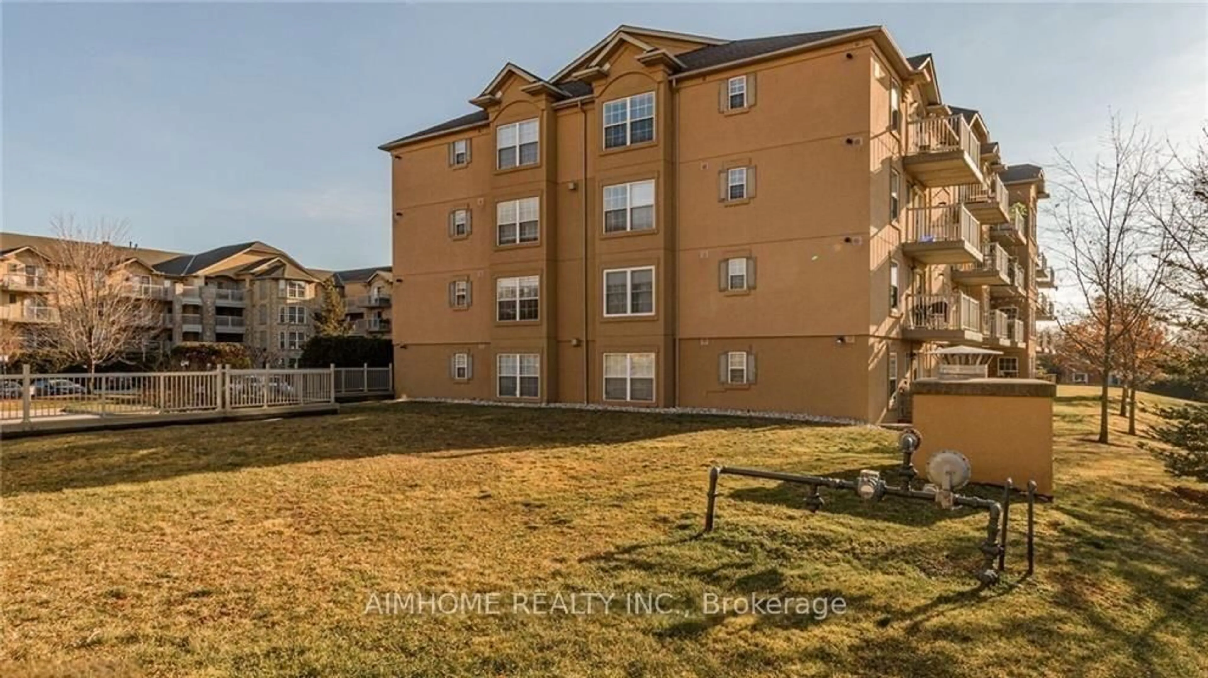 A pic from outside/outdoor area/front of a property/back of a property/a pic from drone, unknown for 1450 BISHOPS Gate #310, Oakville Ontario L6M 4N1