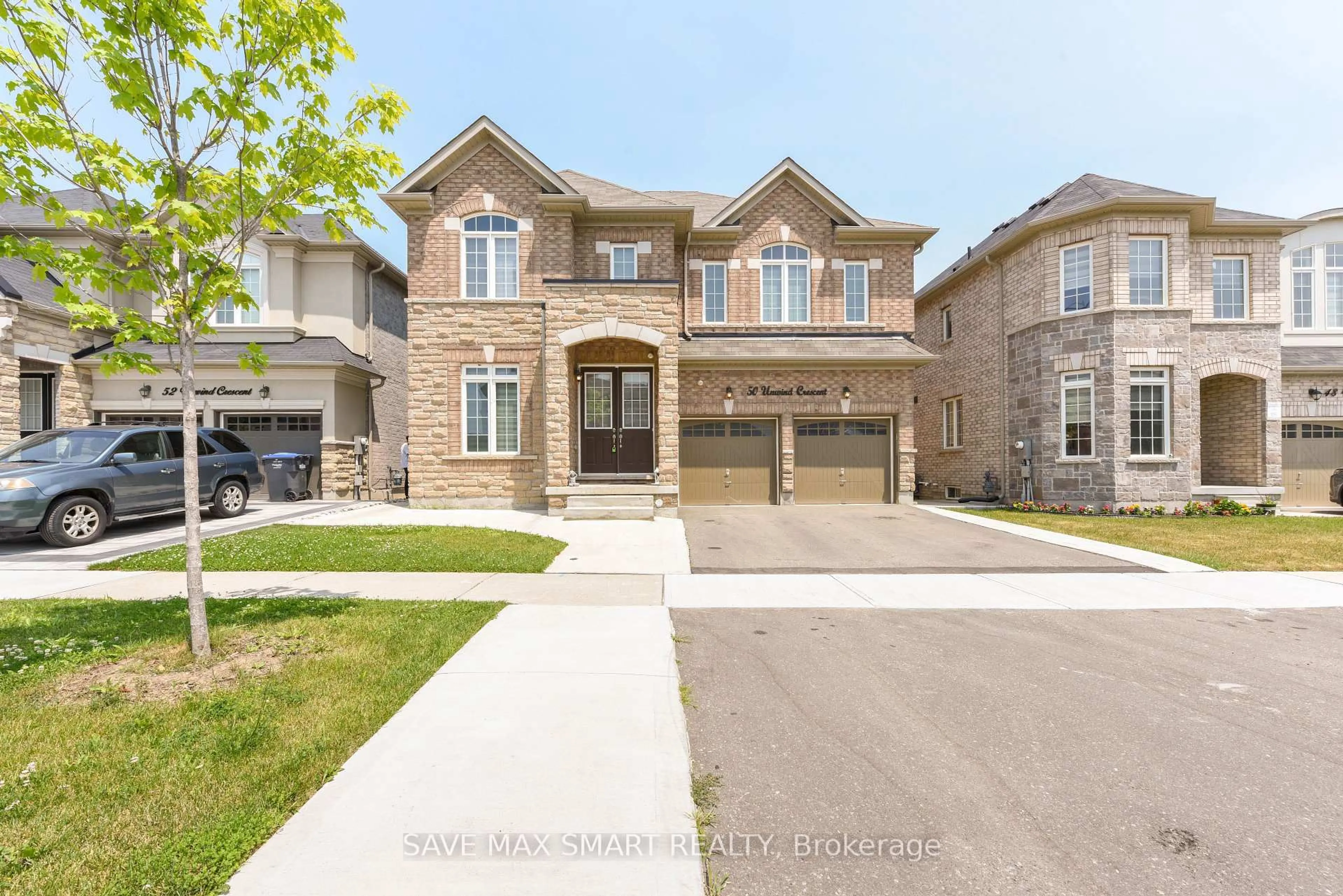 Home with brick exterior material, street for 50 Unwind Cres, Brampton Ontario L6X 5J6