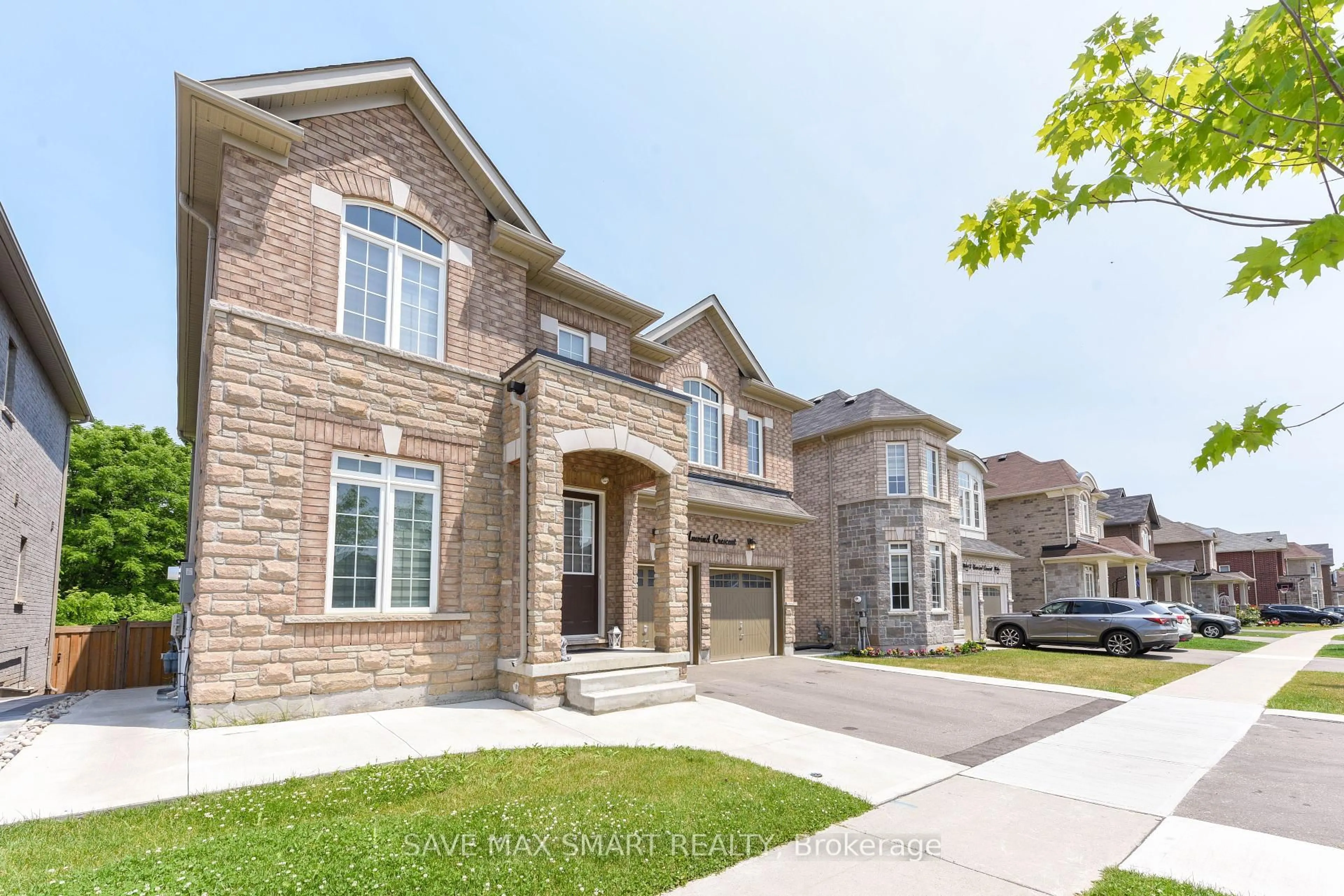 Home with brick exterior material, street for 50 Unwind Cres, Brampton Ontario L6X 5J6