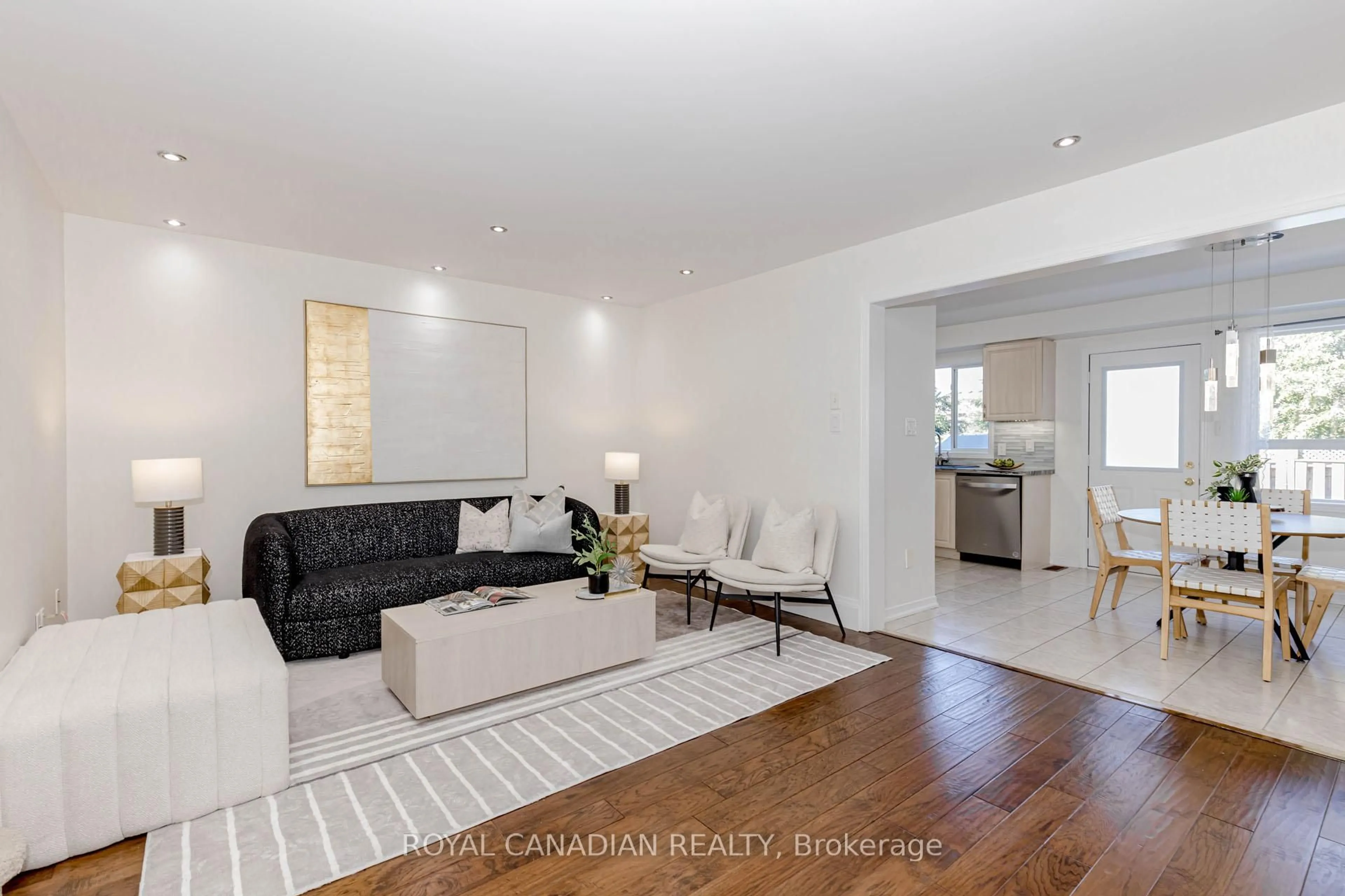Living room with furniture, wood/laminate floor for 1840 Mccoy Ave, Burlington Ontario L7L 7M2