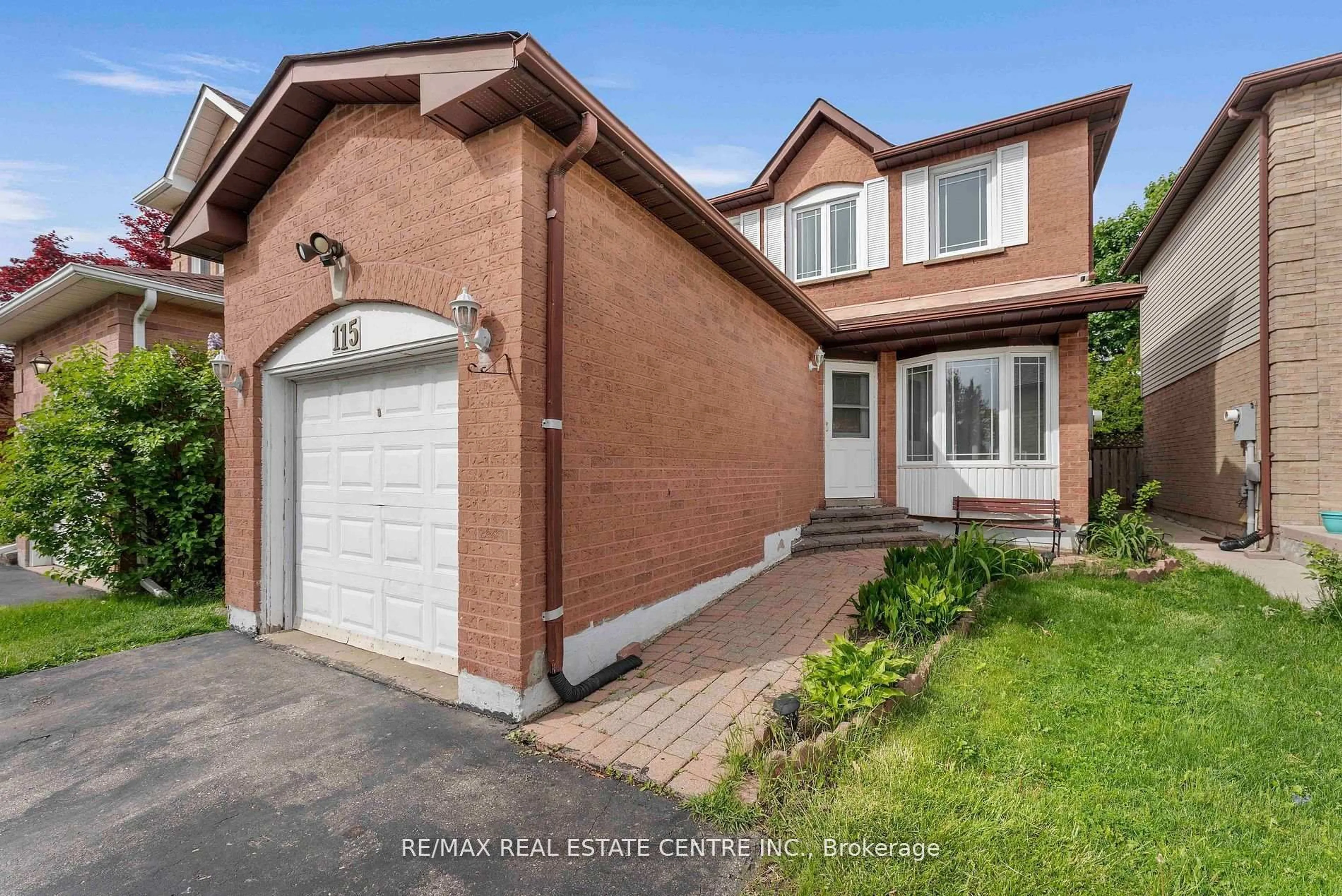 Home with brick exterior material, street for 115 Ecclestone Dr, Brampton Ontario L6X 3P4