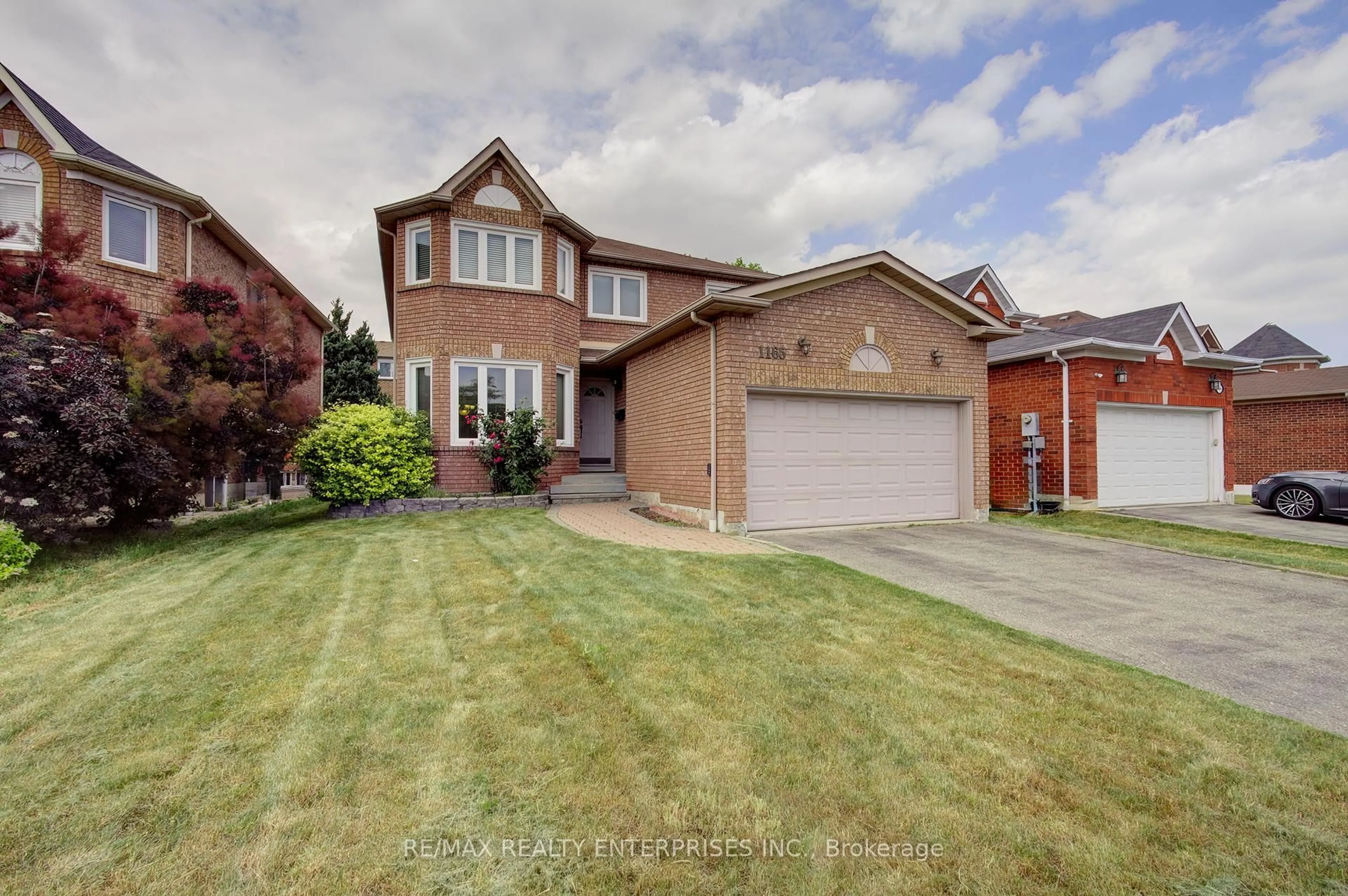 Home with brick exterior material, street for 1165 White Clover Way, Mississauga Ontario L5V 1K9