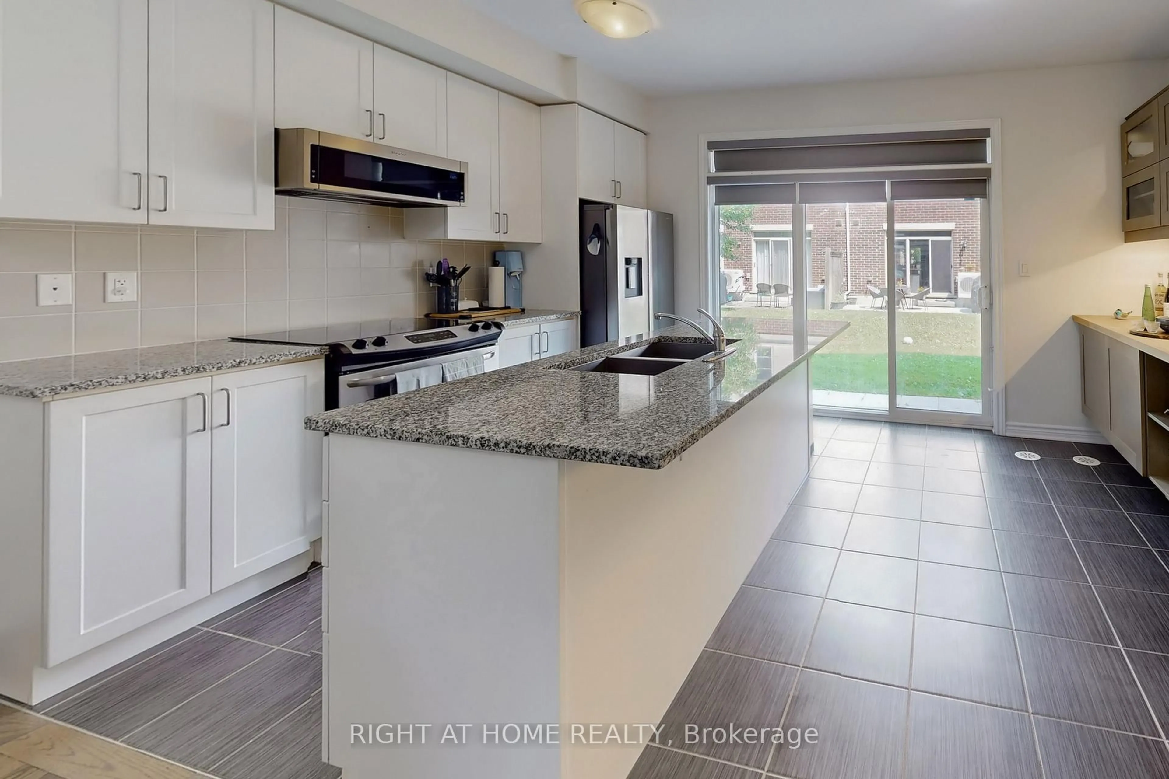 Open concept kitchen, ceramic/tile floor for 636 Evans Ave #65, Toronto Ontario M8W 0A8