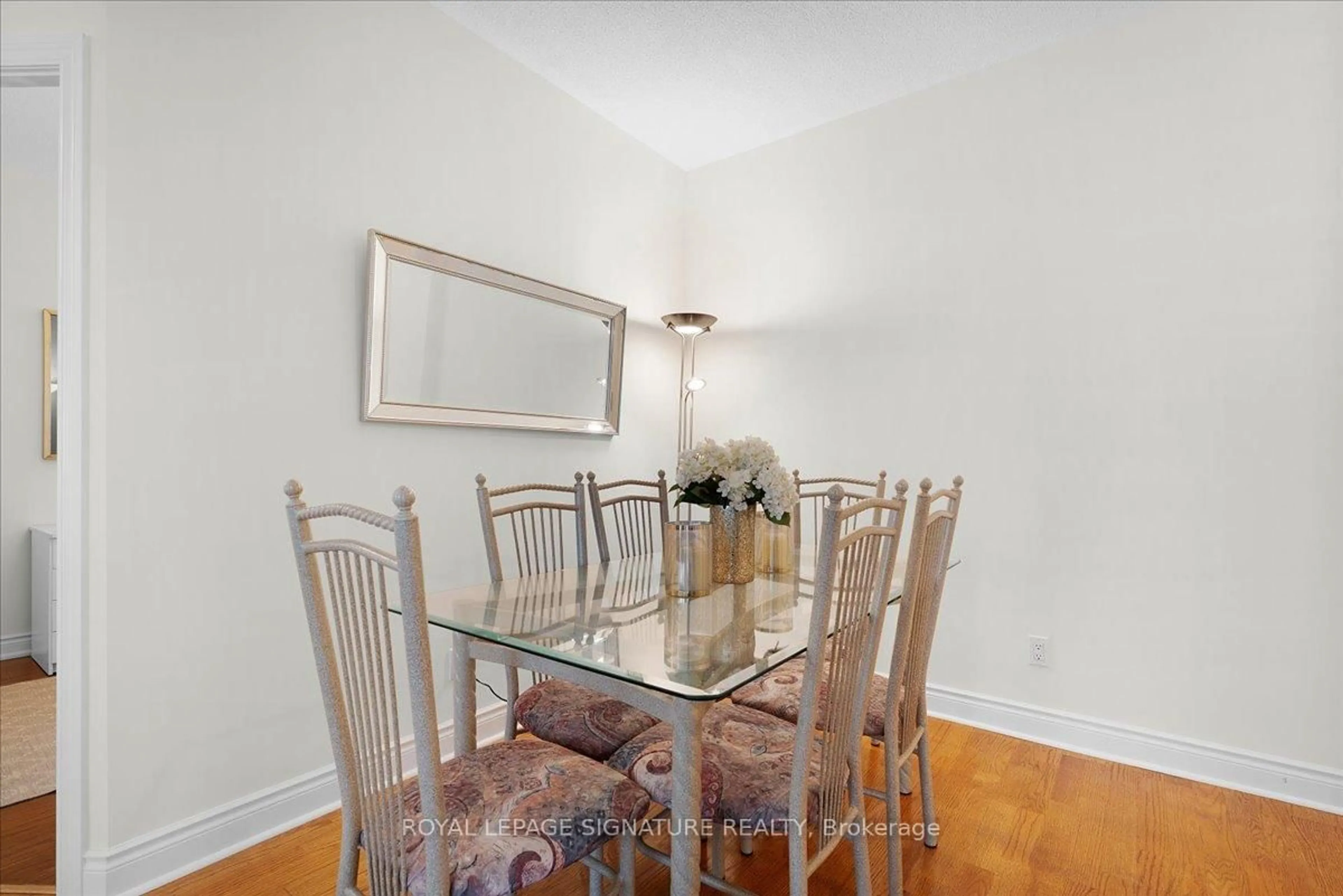 Dining room, wood/laminate floor for 1 Lomond Dr #802, Toronto Ontario M8X 2Z3