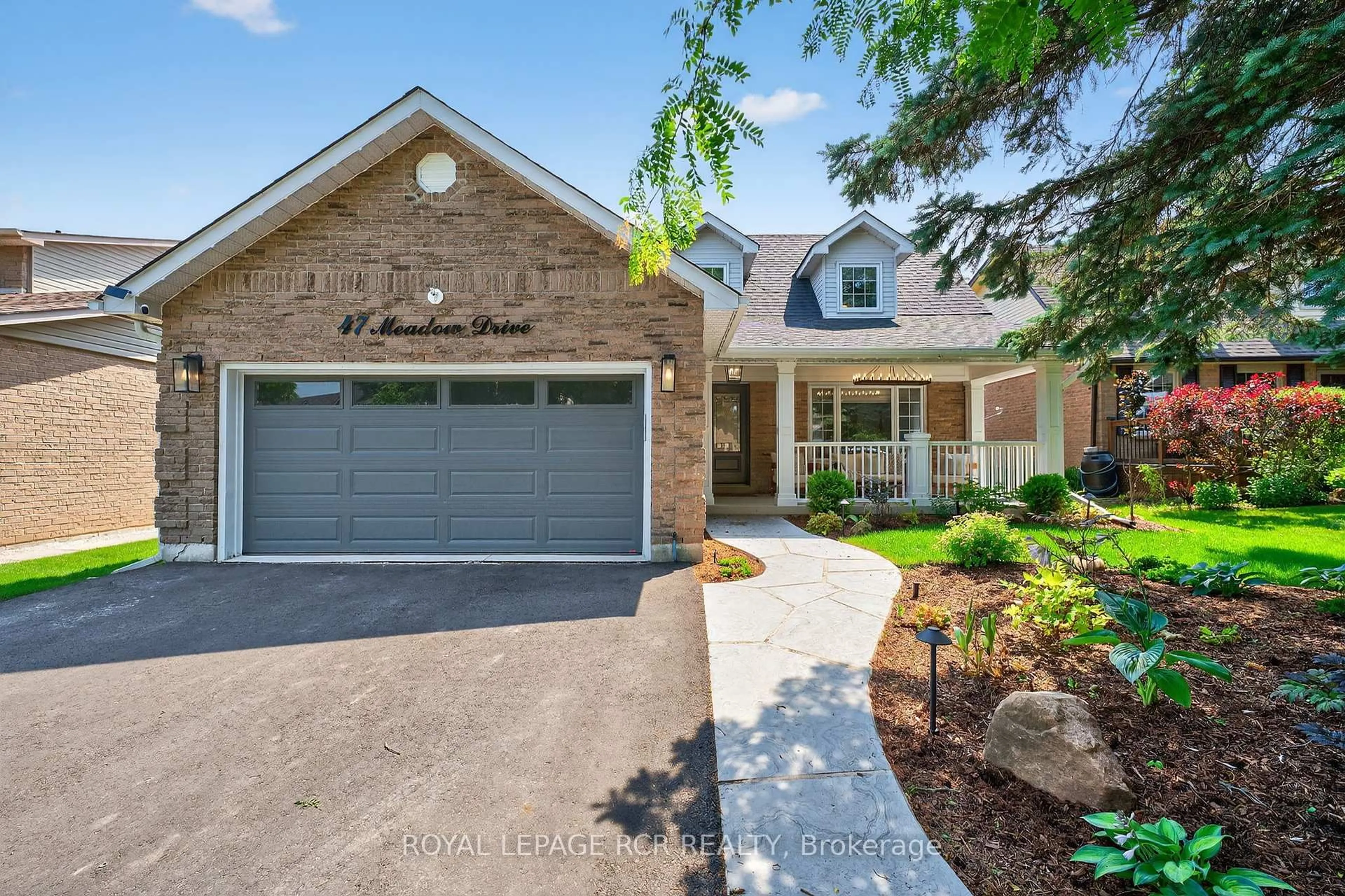 Home with brick exterior material, street for 47 Meadow Dr, Orangeville Ontario L9W 4C7