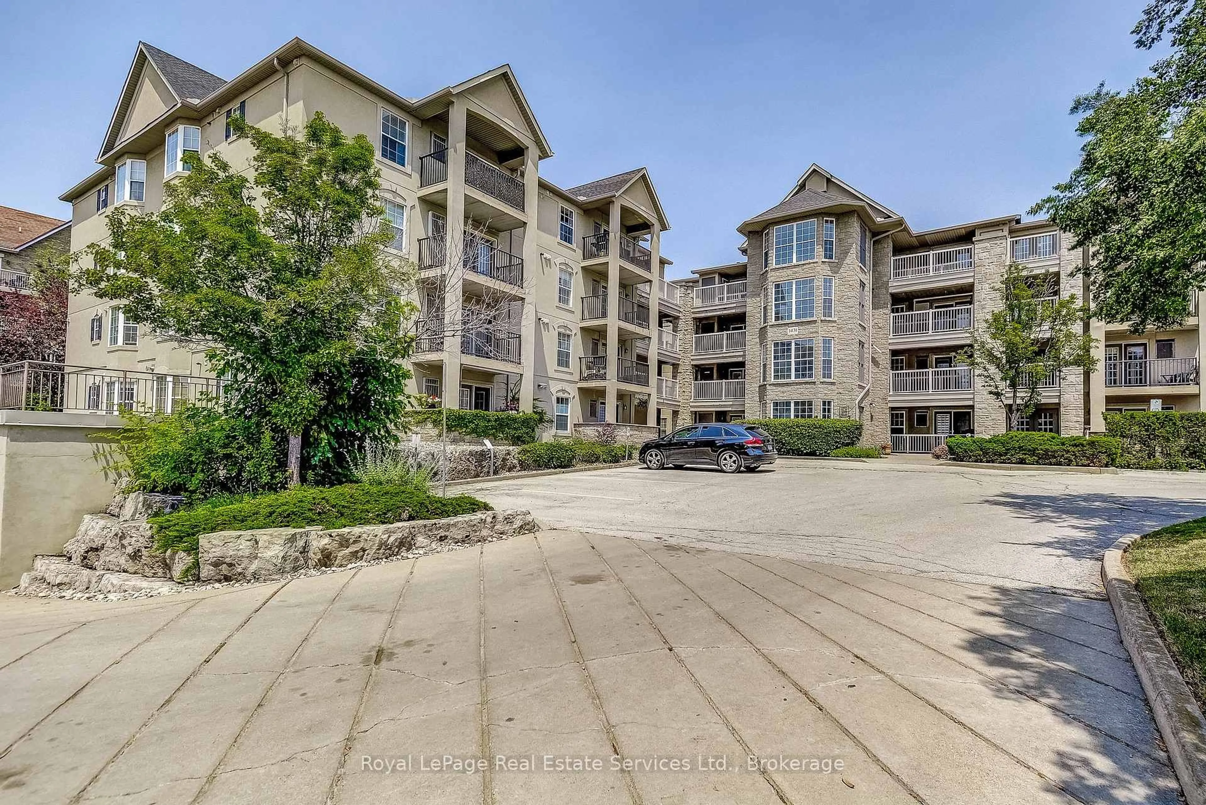 A pic from outside/outdoor area/front of a property/back of a property/a pic from drone, water/lake/river/ocean view for 1431 Walkers Line #411, Burlington Ontario L7M 4P3