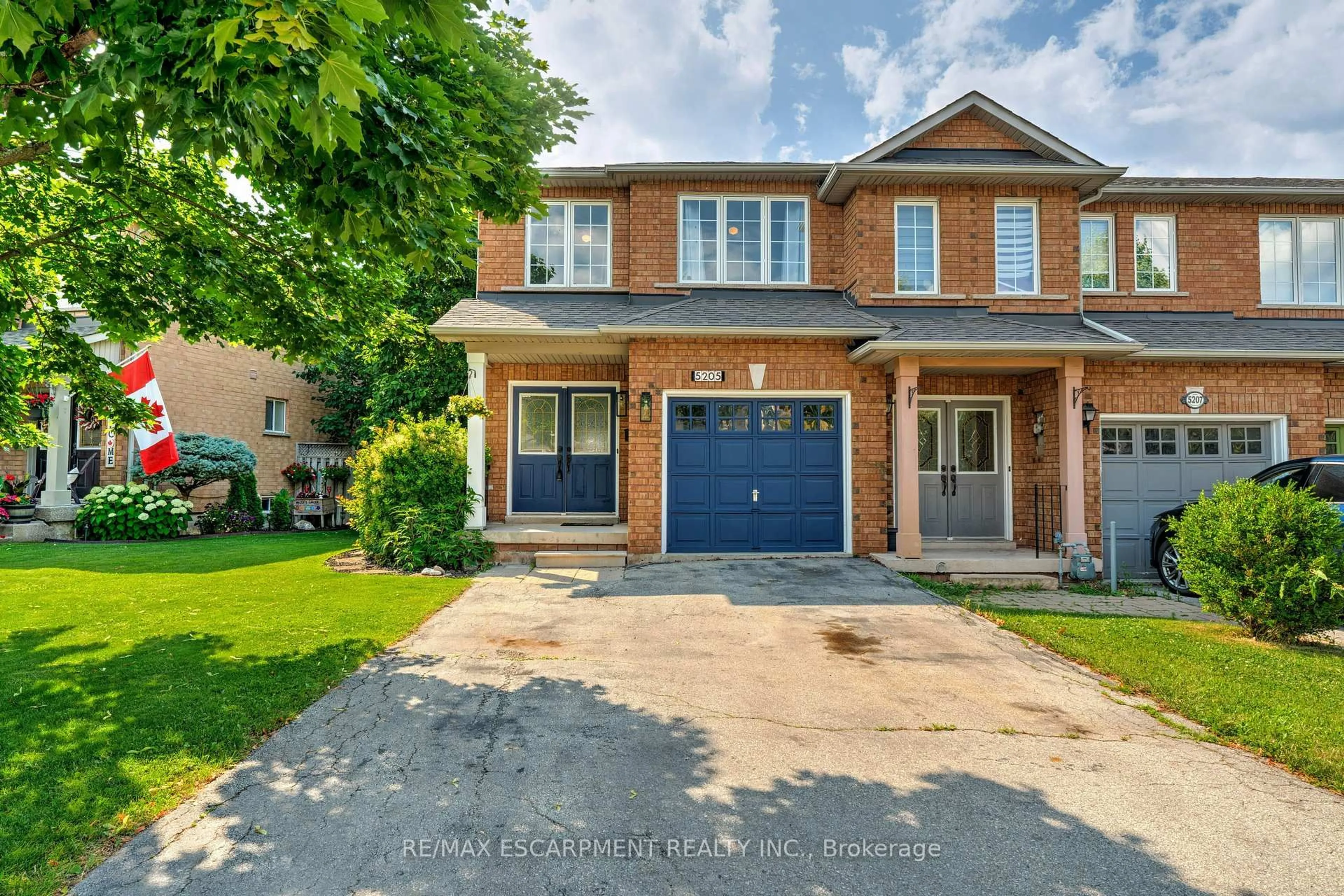 Home with brick exterior material, street for 5205 THORNBURN Dr, Burlington Ontario L7L 6R4