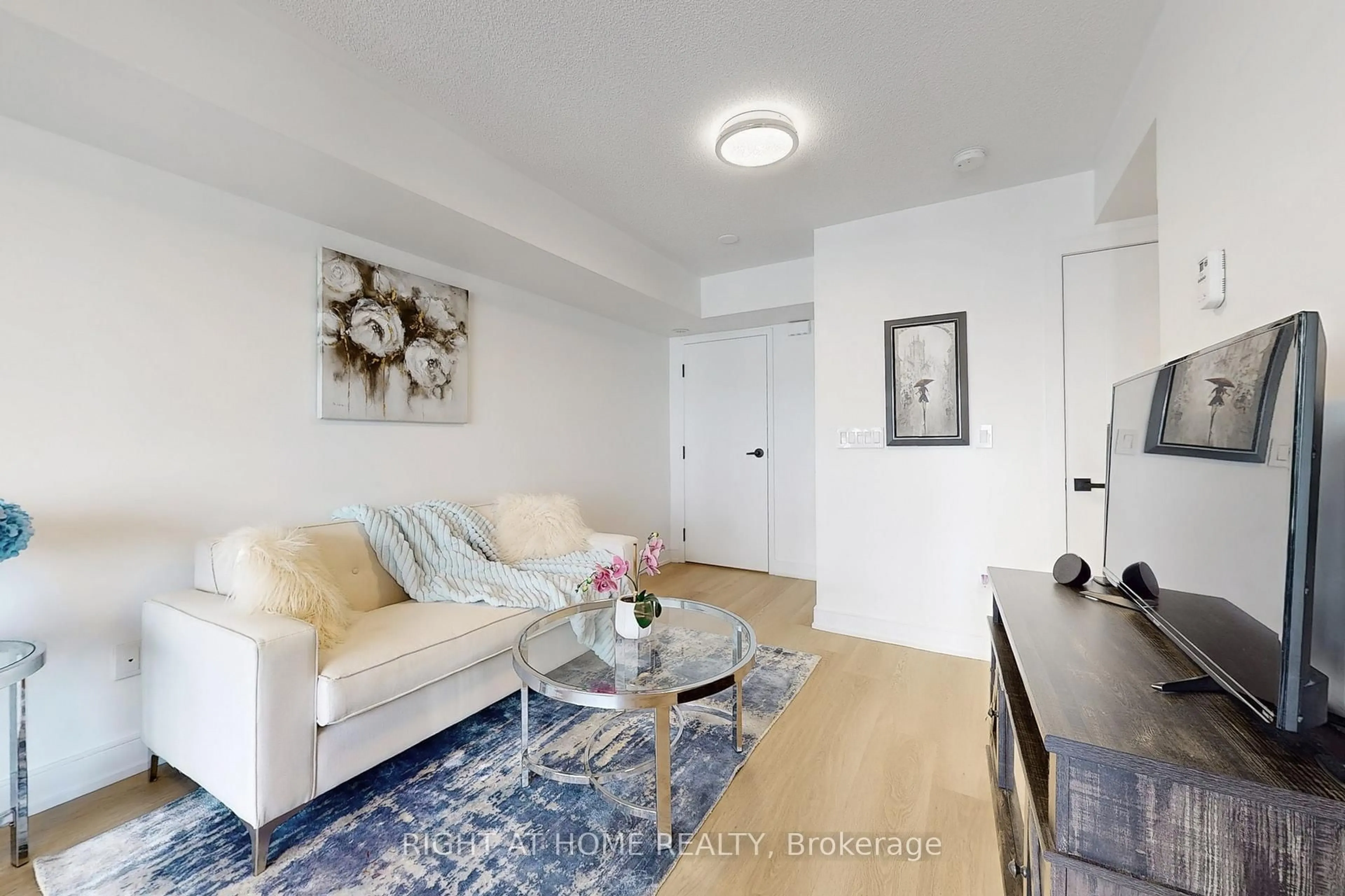 Living room with furniture, unknown for 138 Widdicombe Hill Blvd #710, Toronto Ontario M9R 4A6