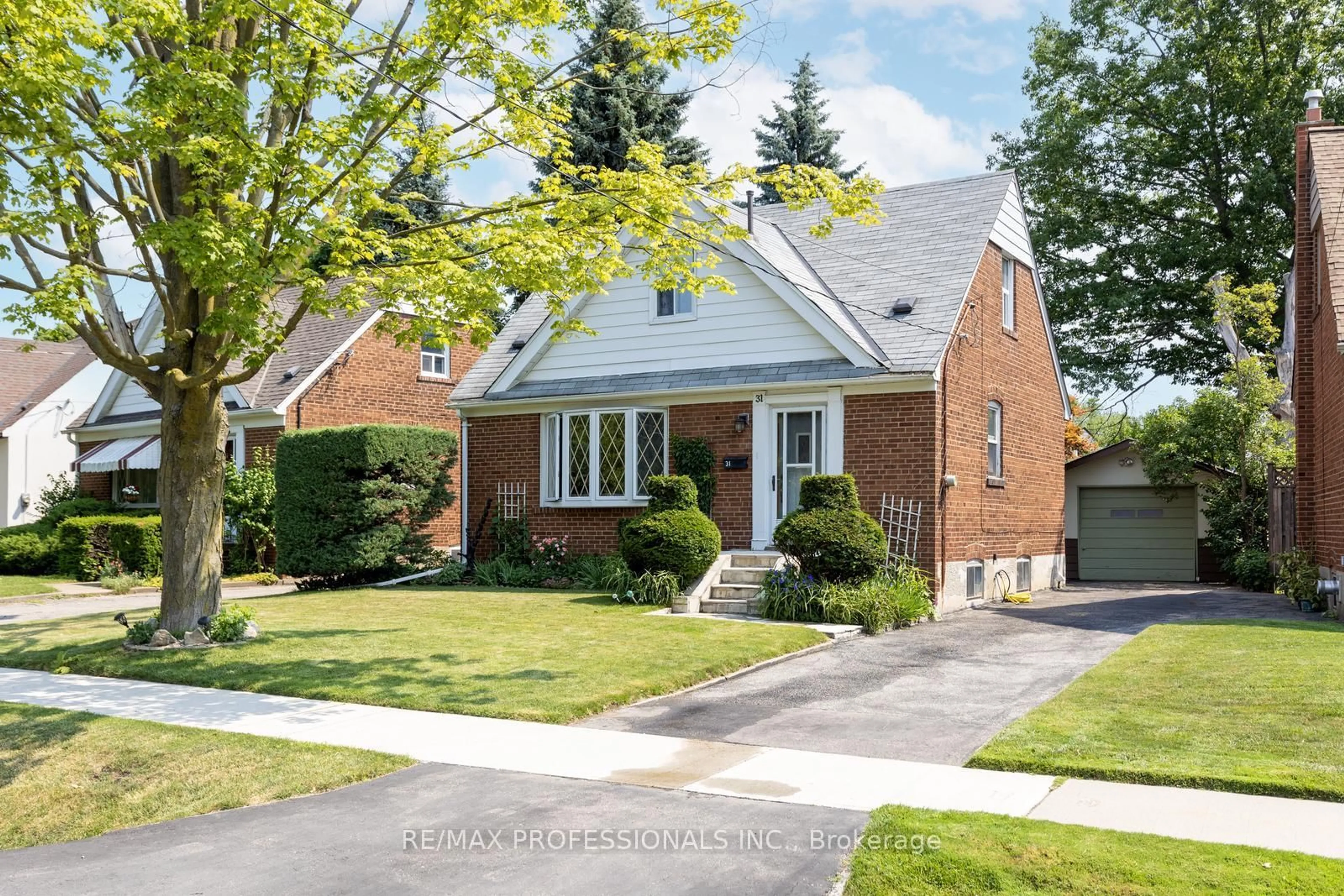 Home with brick exterior material, street for 31 Westleigh Cres, Toronto Ontario M8W 3Z6