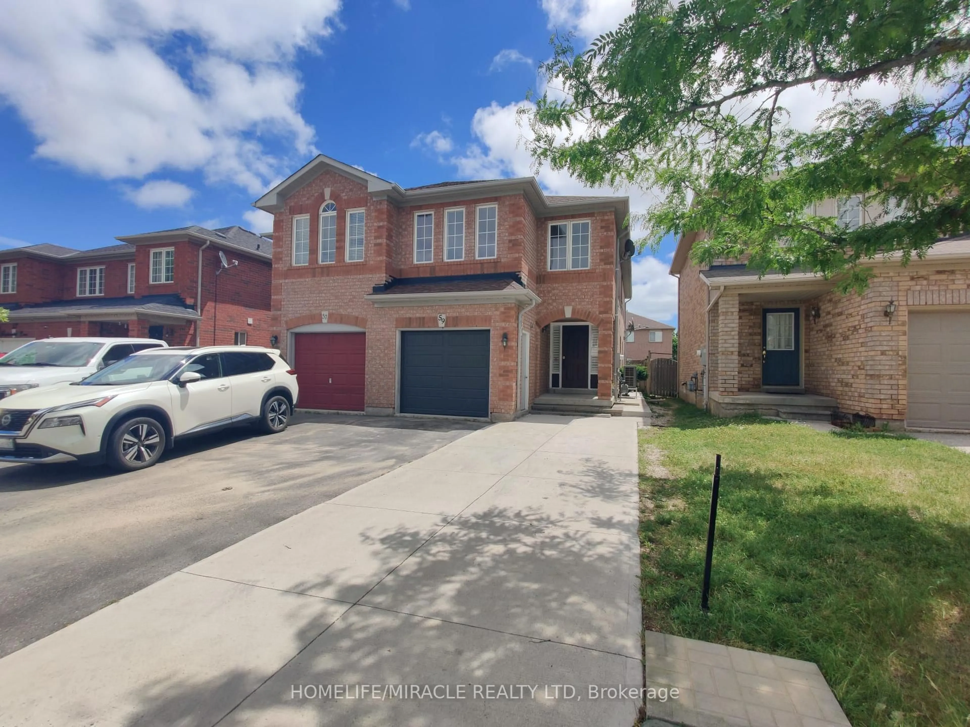 Home with brick exterior material, street for 59 Roadmaster Lane, Brampton Ontario L7A 3A7
