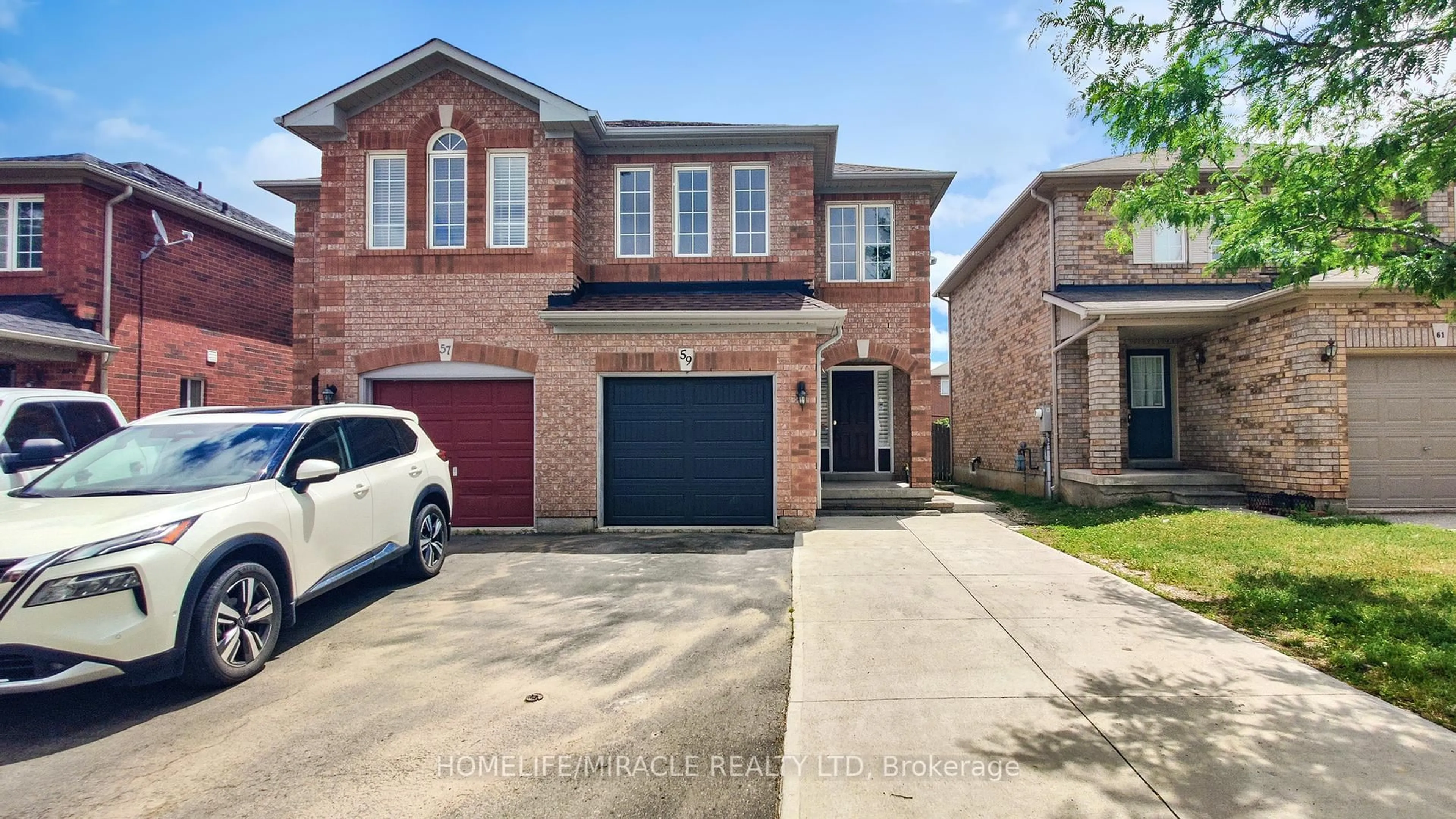 Home with brick exterior material, street for 59 Roadmaster Lane, Brampton Ontario L7A 3A7