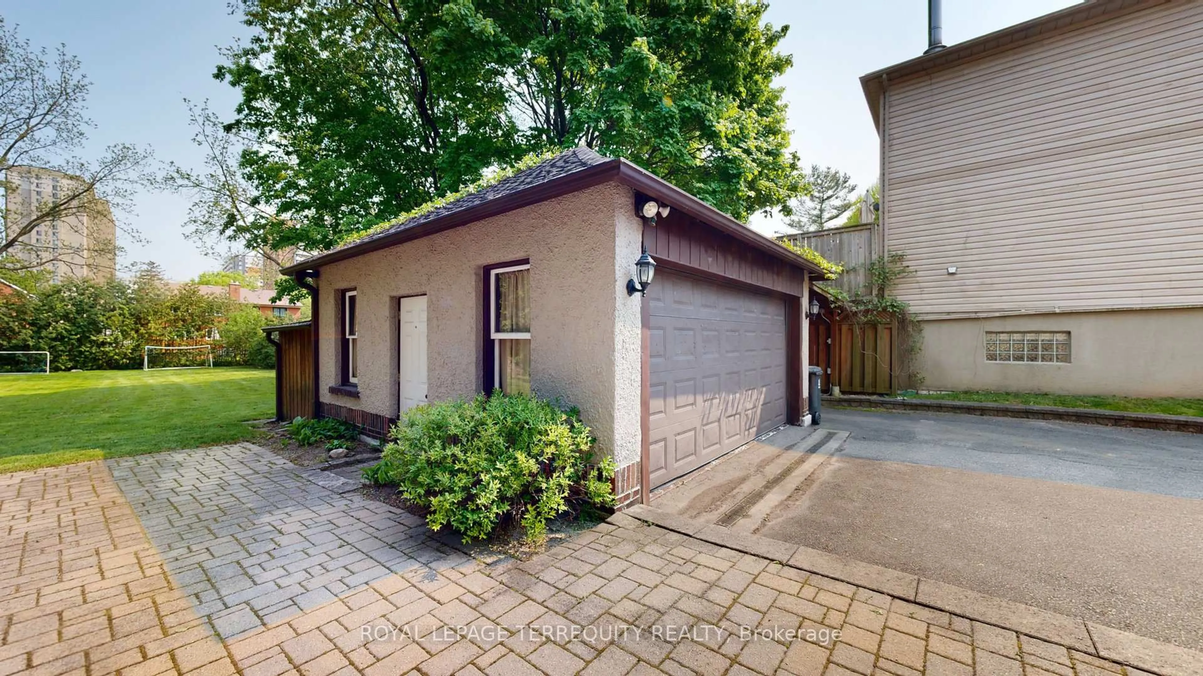 Home with brick exterior material, street for 65 Burnhamthorpe Cres, Toronto Ontario M9A 1G6