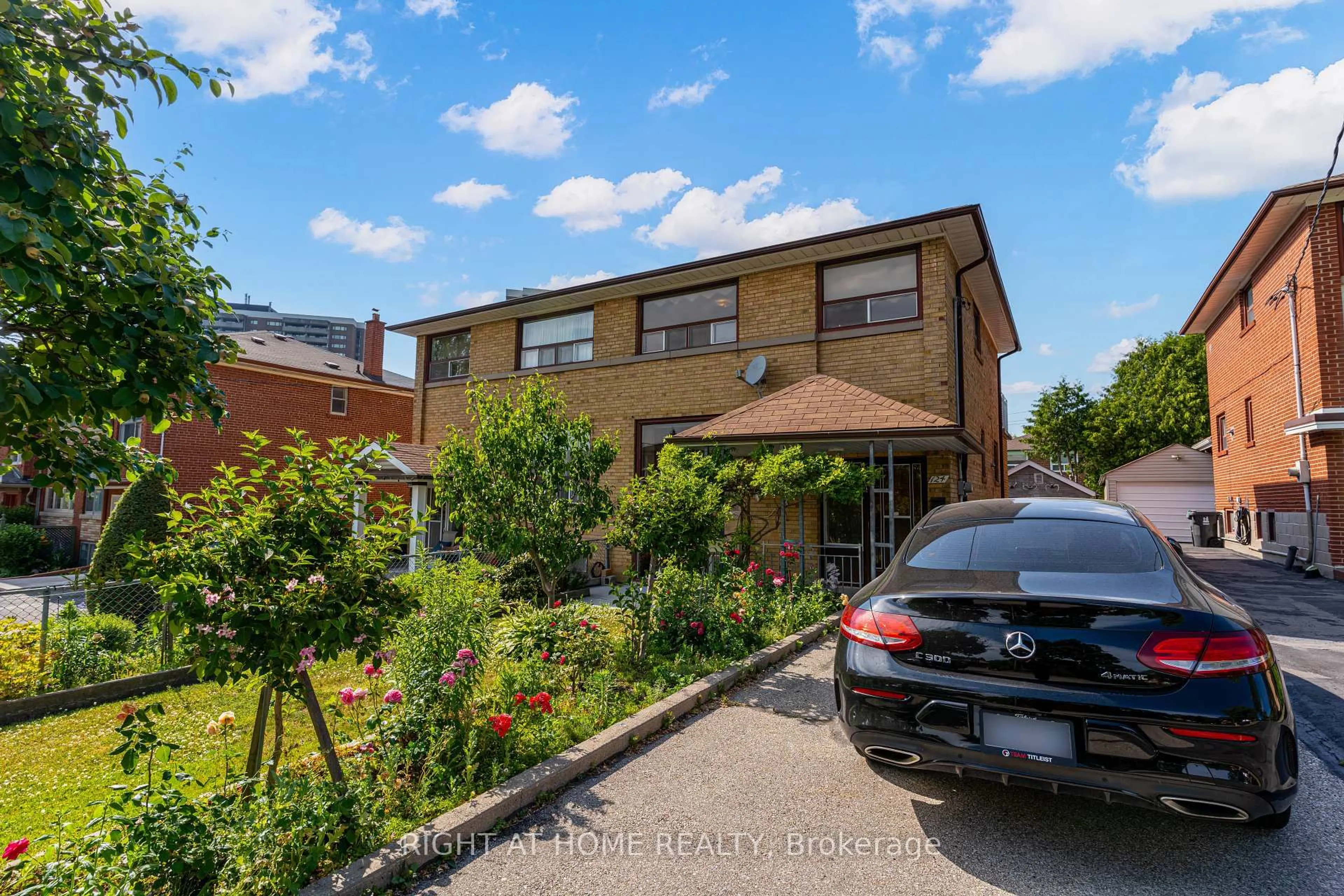 Home with brick exterior material, street for 124 Clairton Cres, Toronto Ontario M6N 2M6