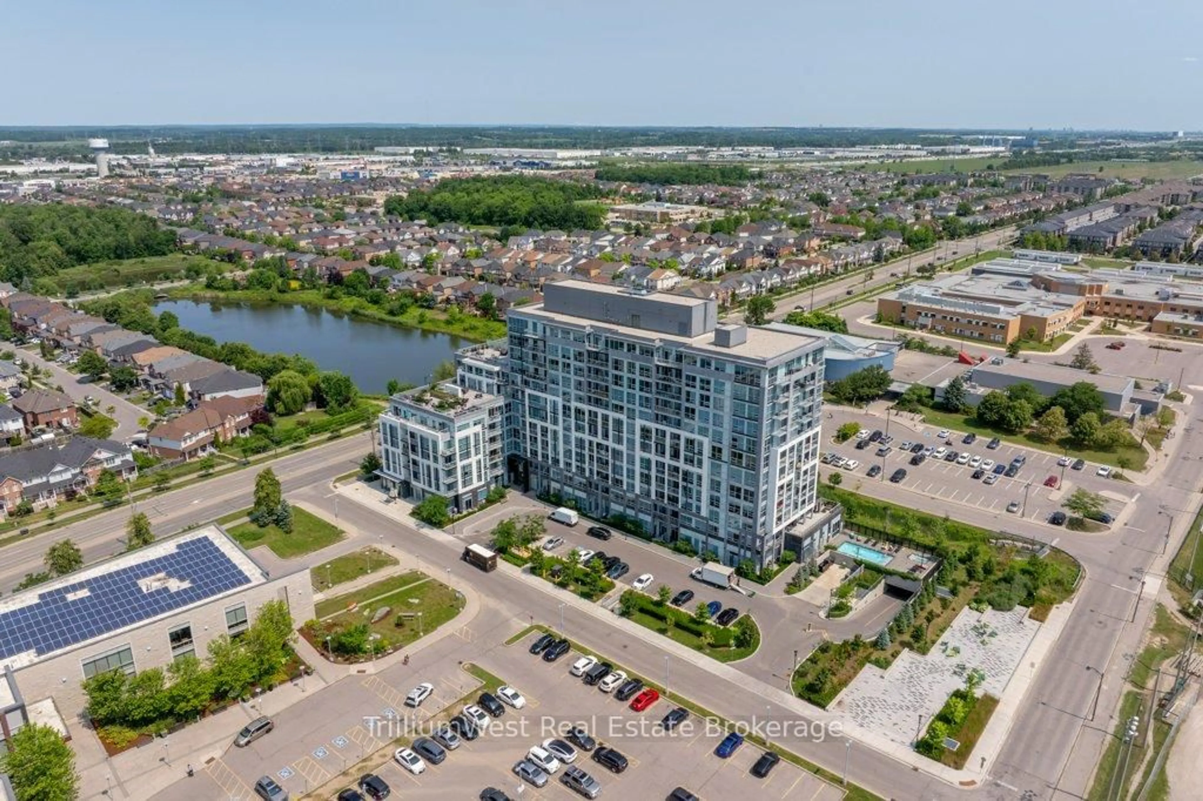A pic from outside/outdoor area/front of a property/back of a property/a pic from drone, water/lake/river/ocean view for 1050 Main St #1004, Milton Ontario L9T 9M3