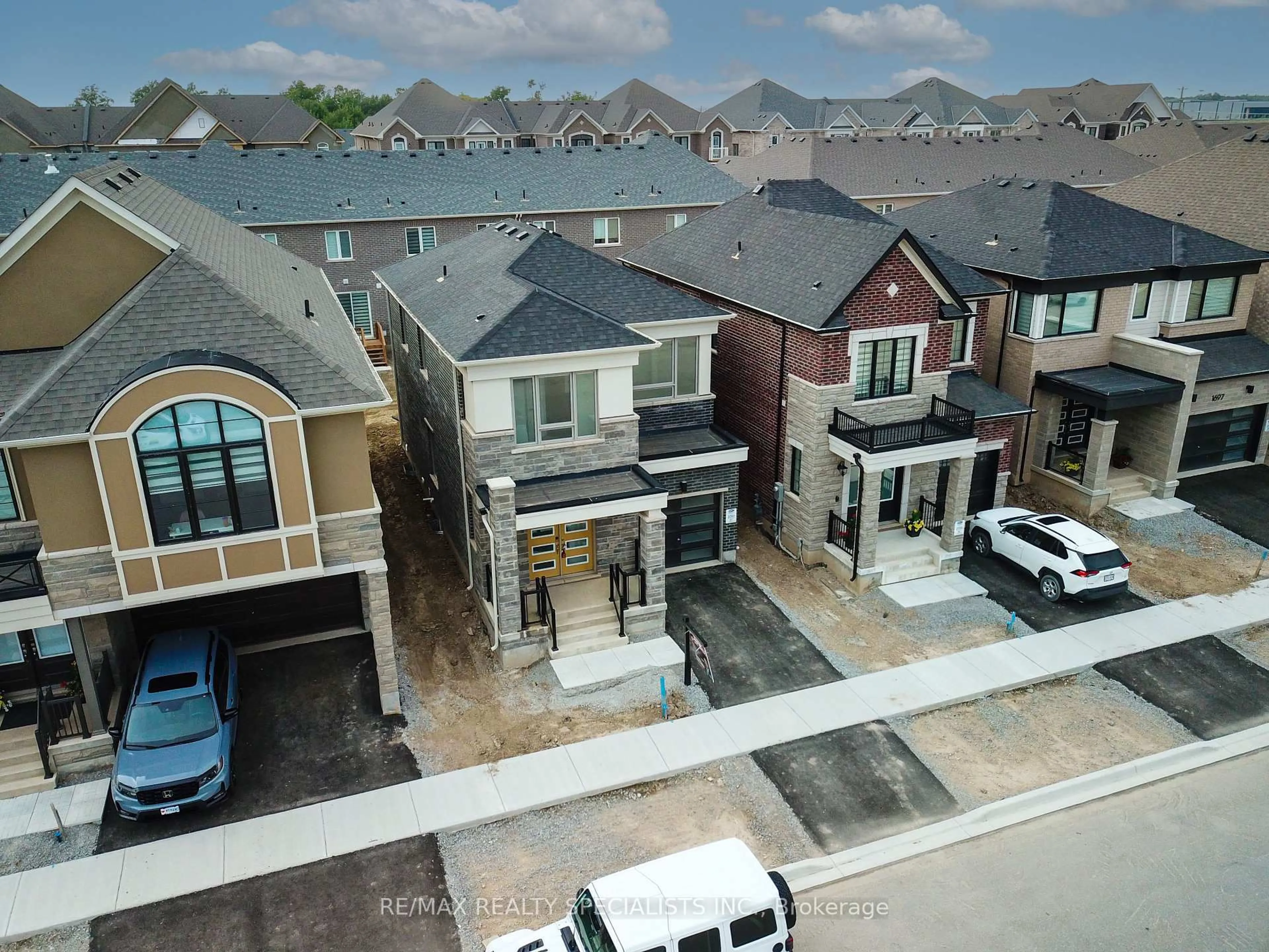 A pic from outside/outdoor area/front of a property/back of a property/a pic from drone, street for 1689 Whitlock Ave, Milton Ontario L9E 1C6
