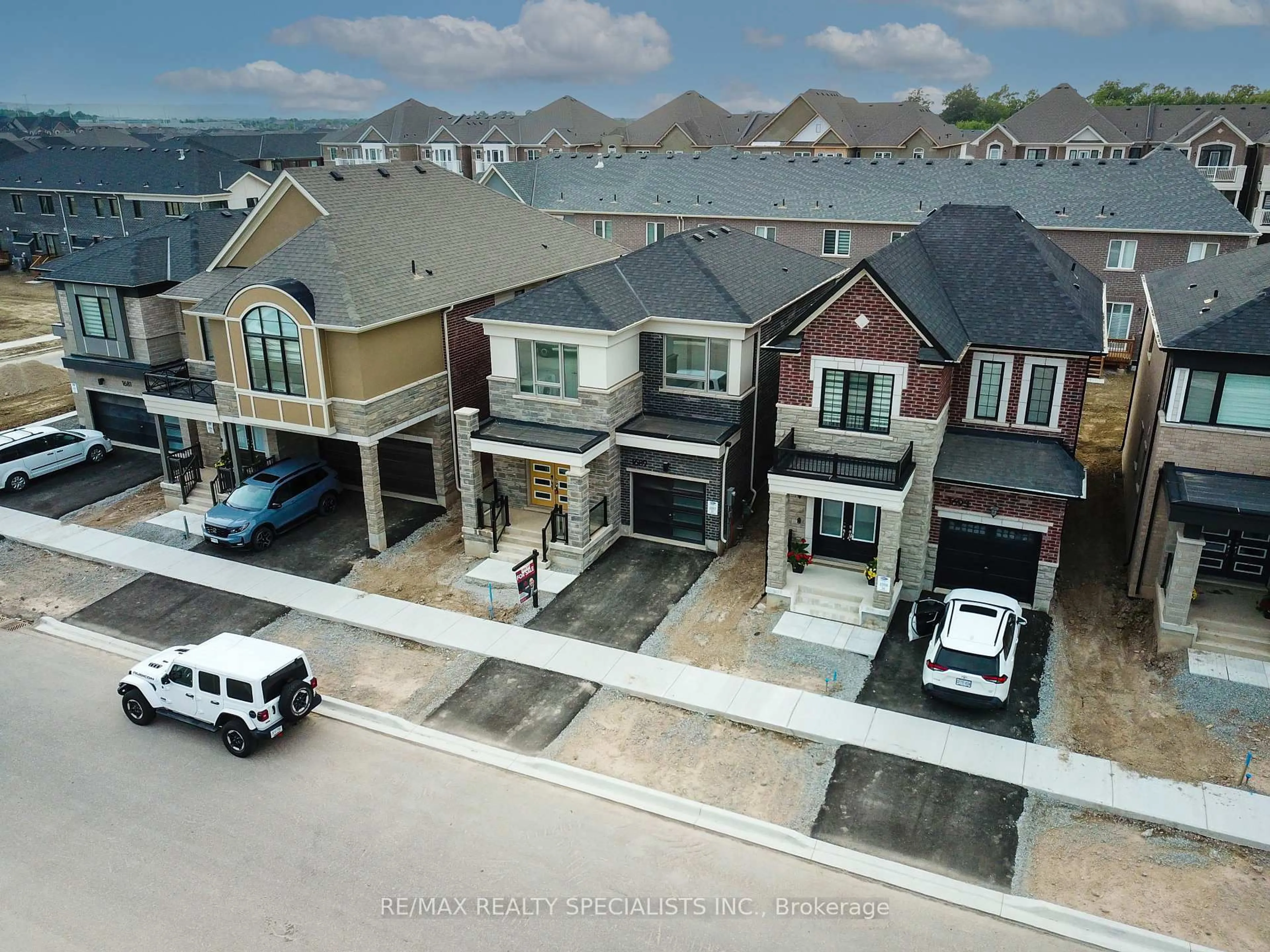 A pic from outside/outdoor area/front of a property/back of a property/a pic from drone, street for 1689 Whitlock Ave, Milton Ontario L9E 1C6