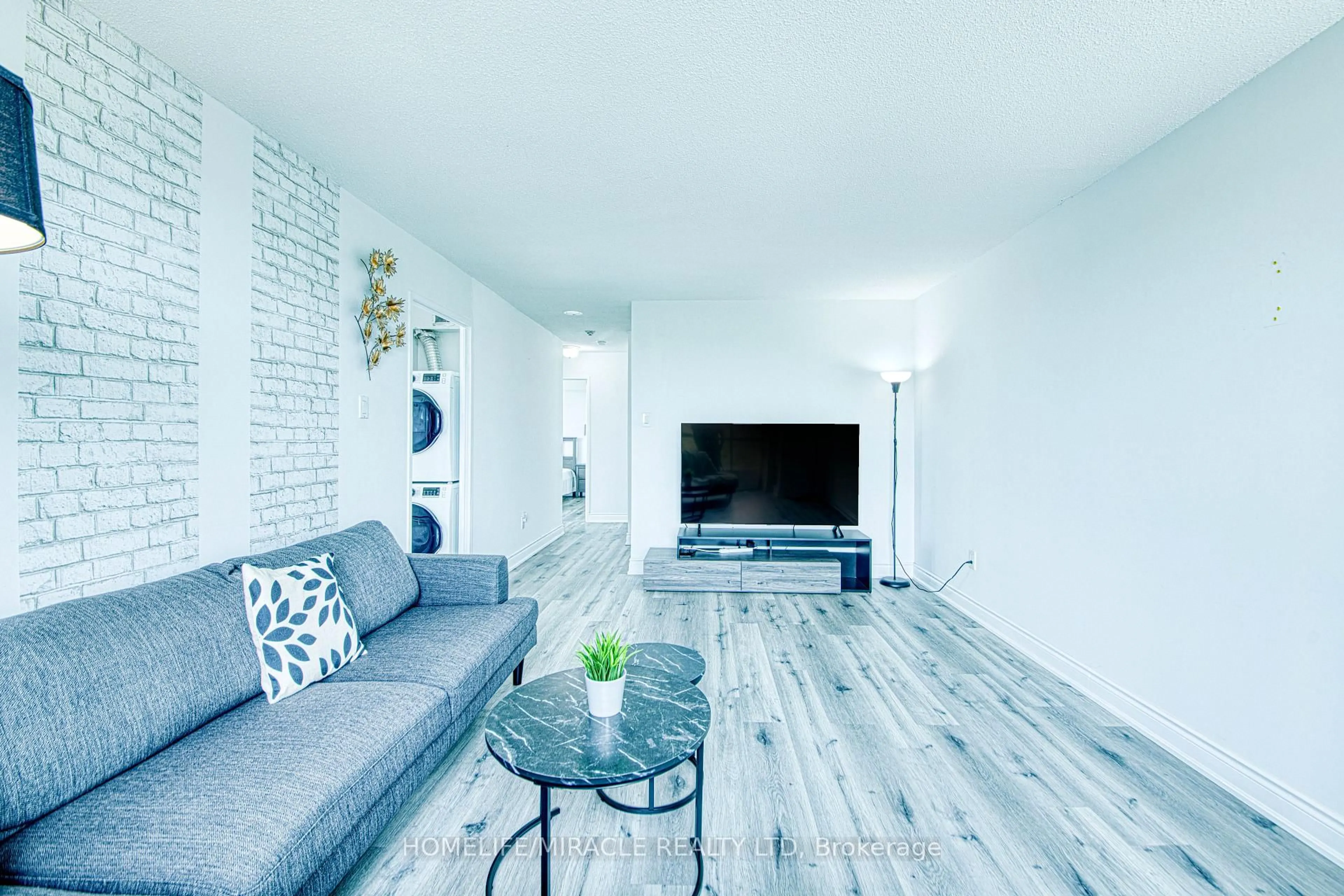 Living room with furniture, unknown for 3077 Weston Rd #1004, Toronto Ontario M9M 3A1