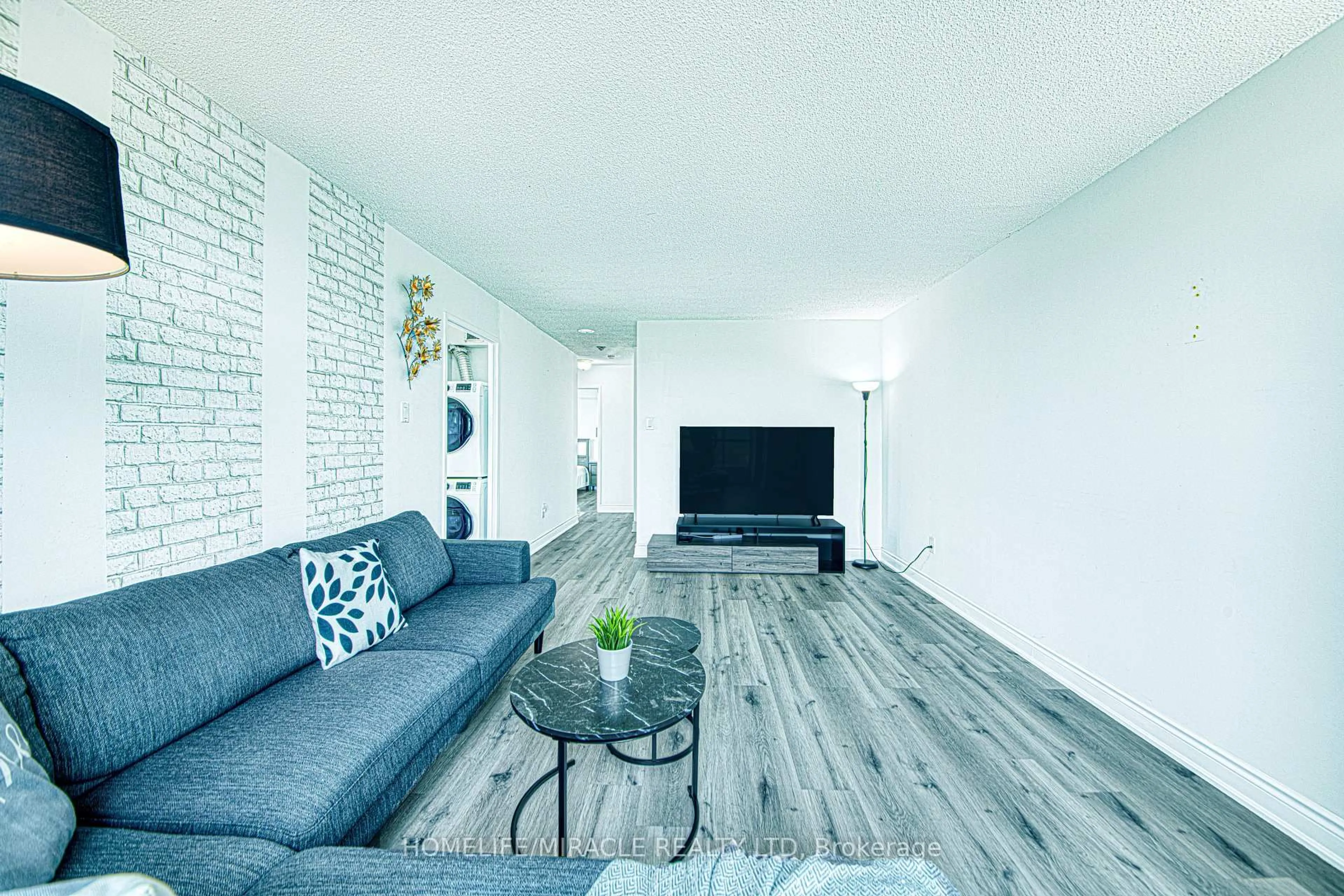 Living room with furniture, unknown for 3077 Weston Rd #1004, Toronto Ontario M9M 3A1