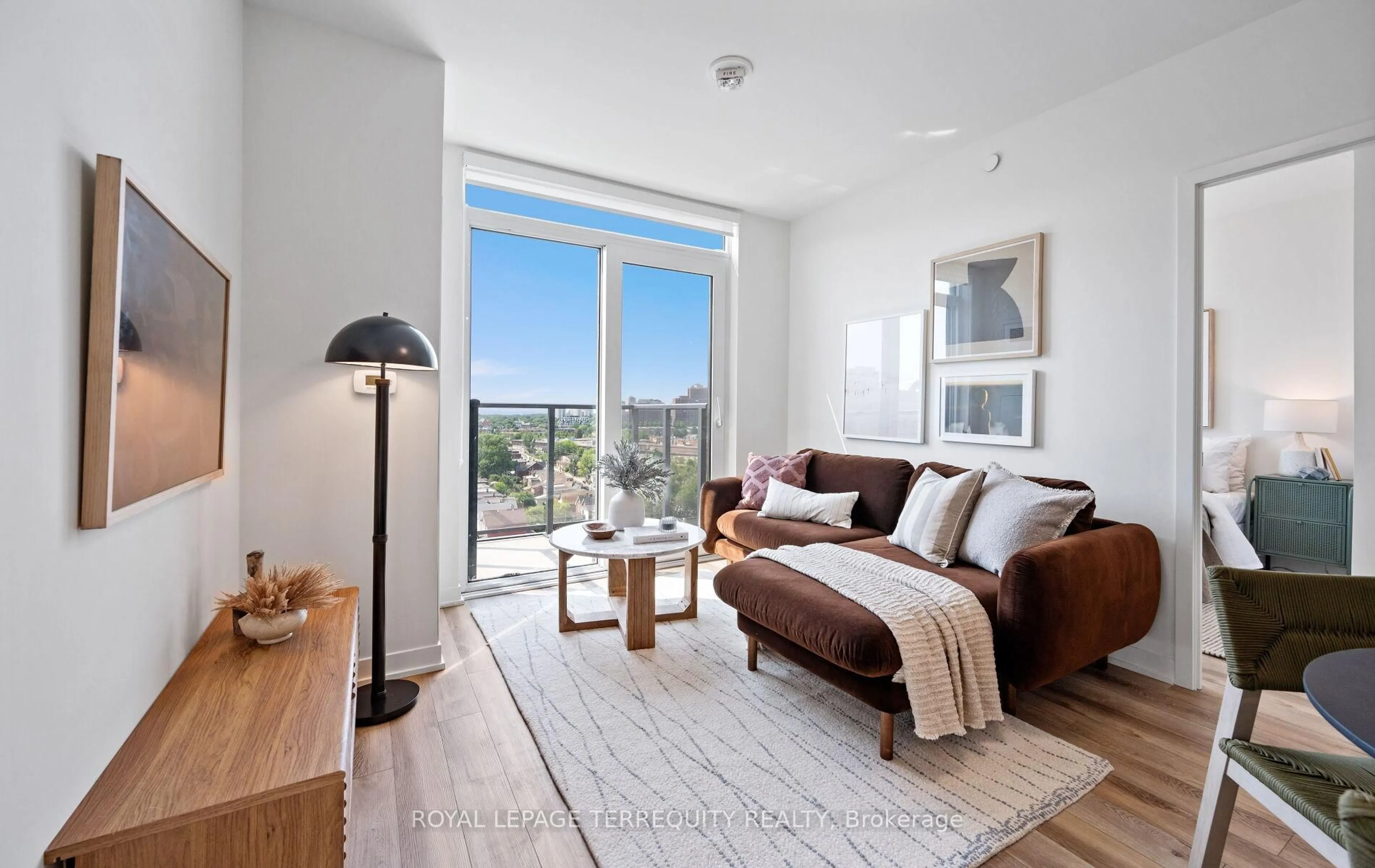 Living room with furniture, wood/laminate floor for 1808 St Clair Ave #1103, Toronto Ontario M6N 0C1