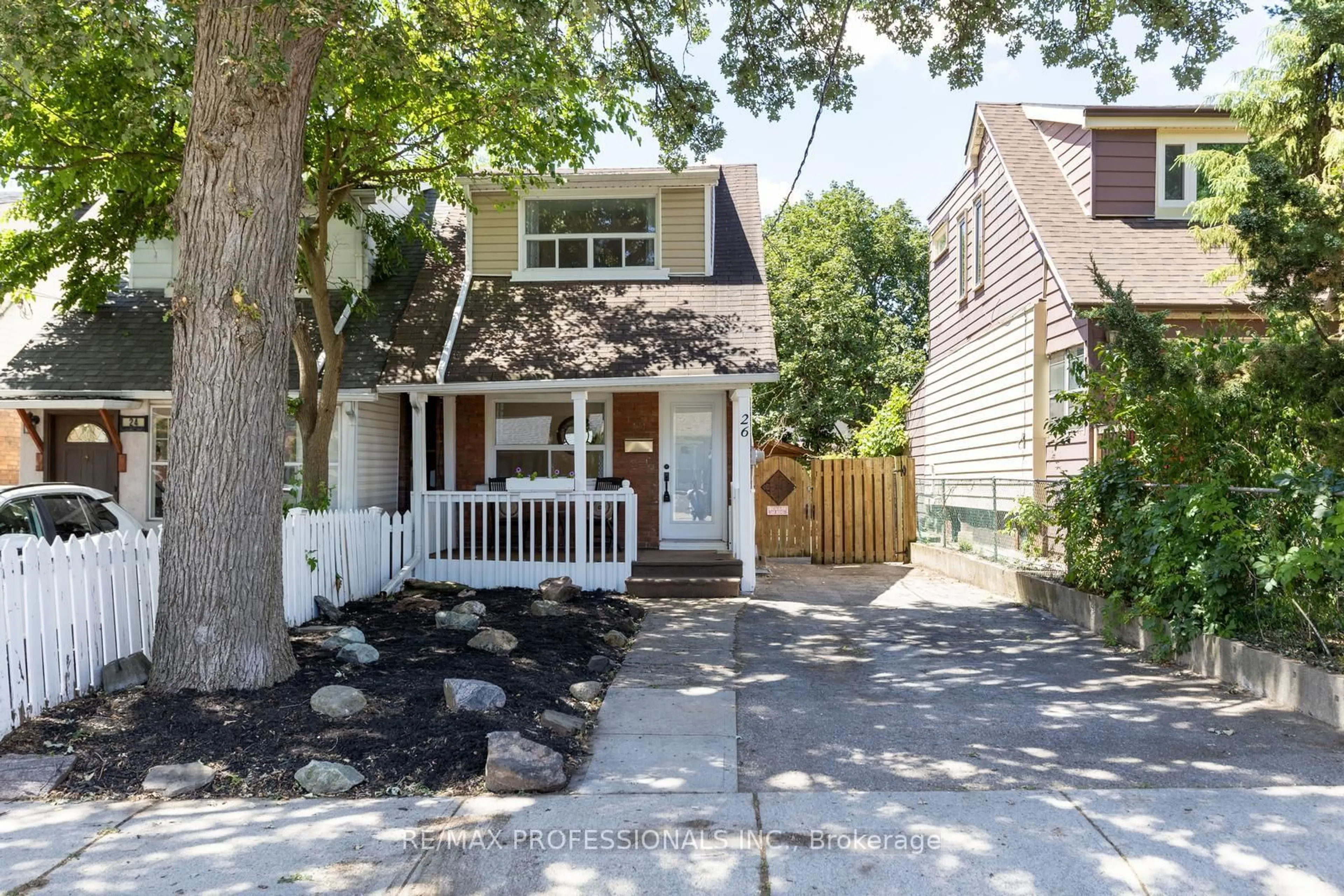 Home with vinyl exterior material, street for 26 Norval St, Toronto Ontario M6N 3Z2