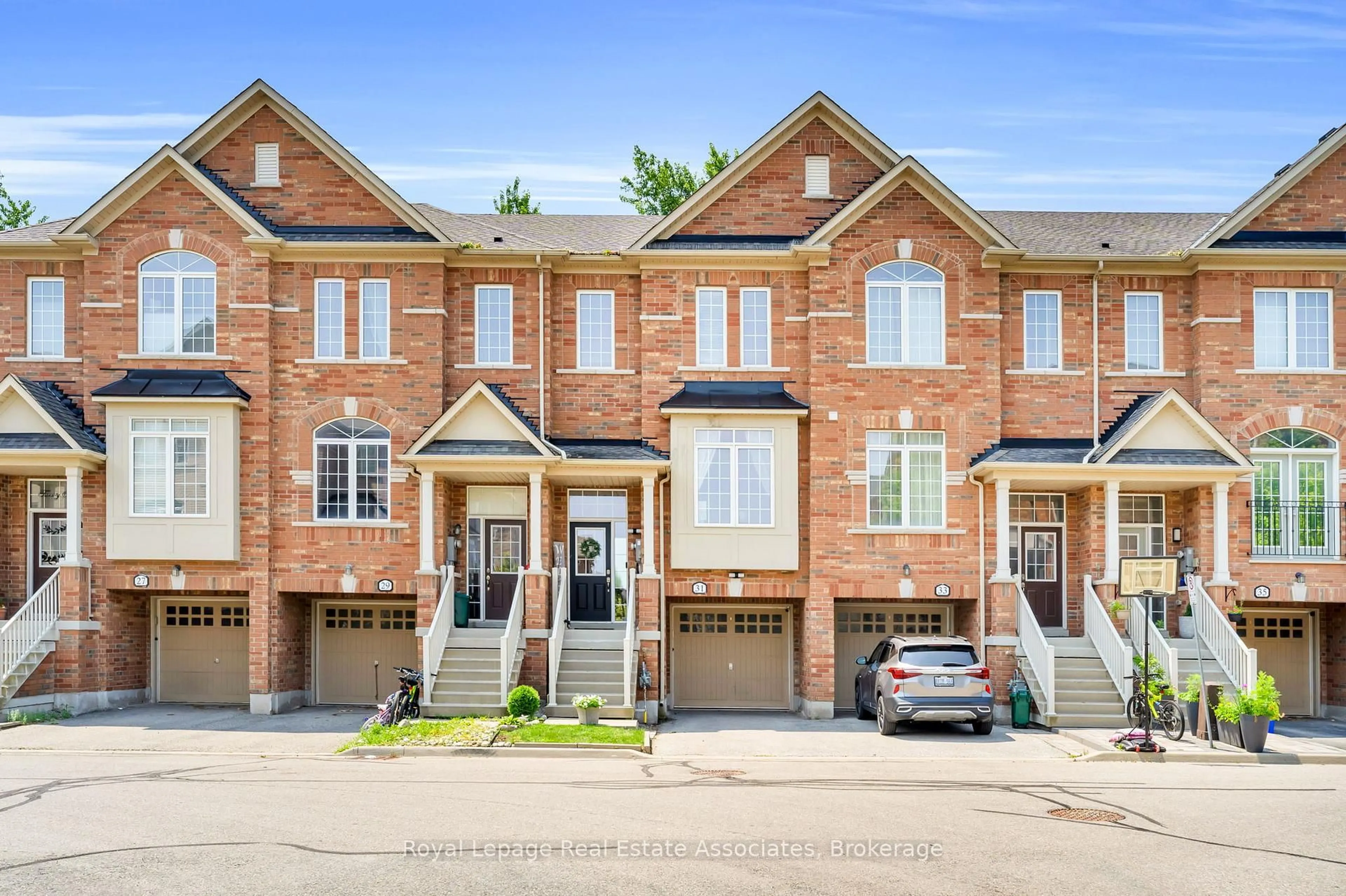 Home with brick exterior material, street for 31 Promenade Tr, Halton Hills Ontario L7G 0G8