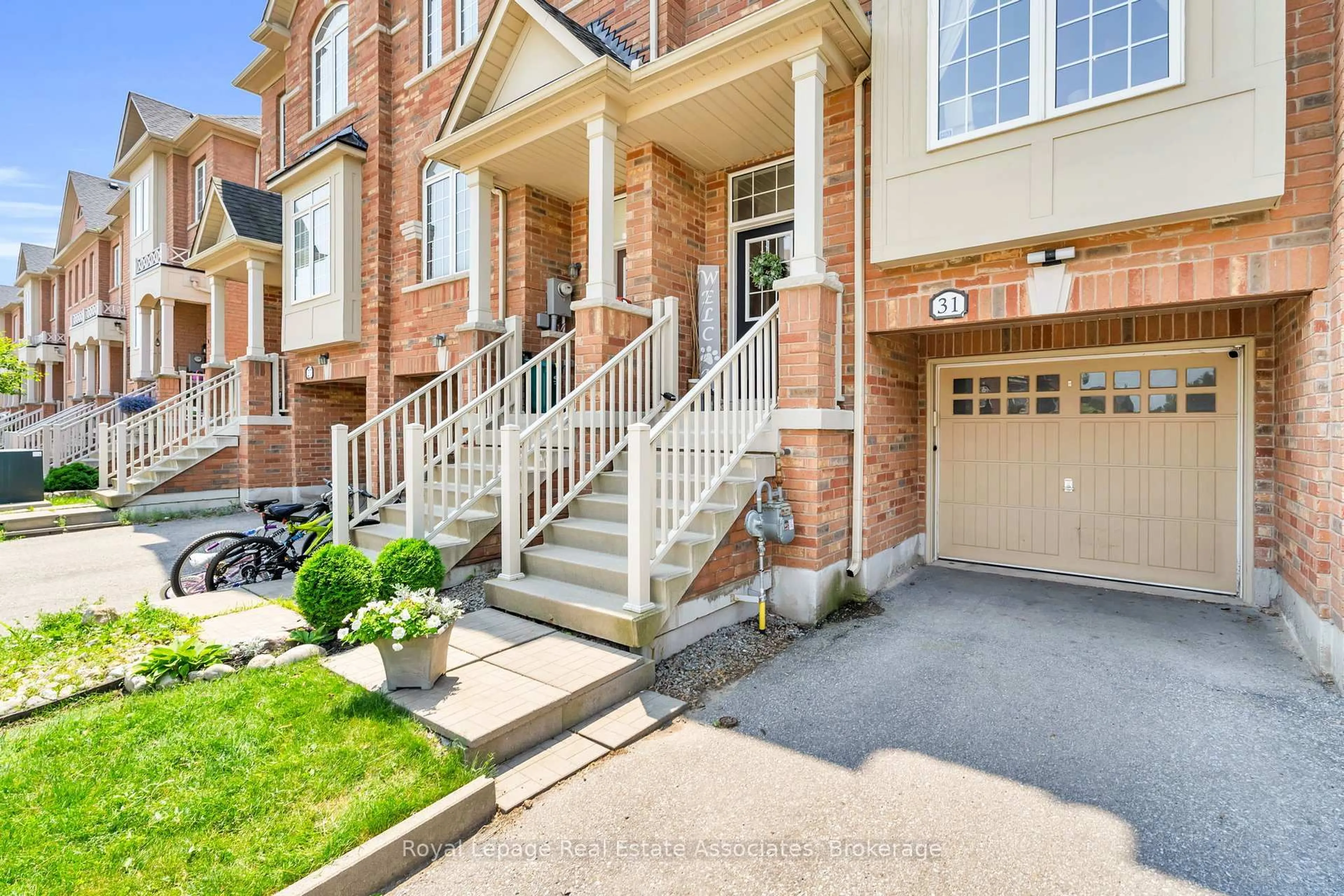 Home with brick exterior material, street for 31 Promenade Tr, Halton Hills Ontario L7G 0G8