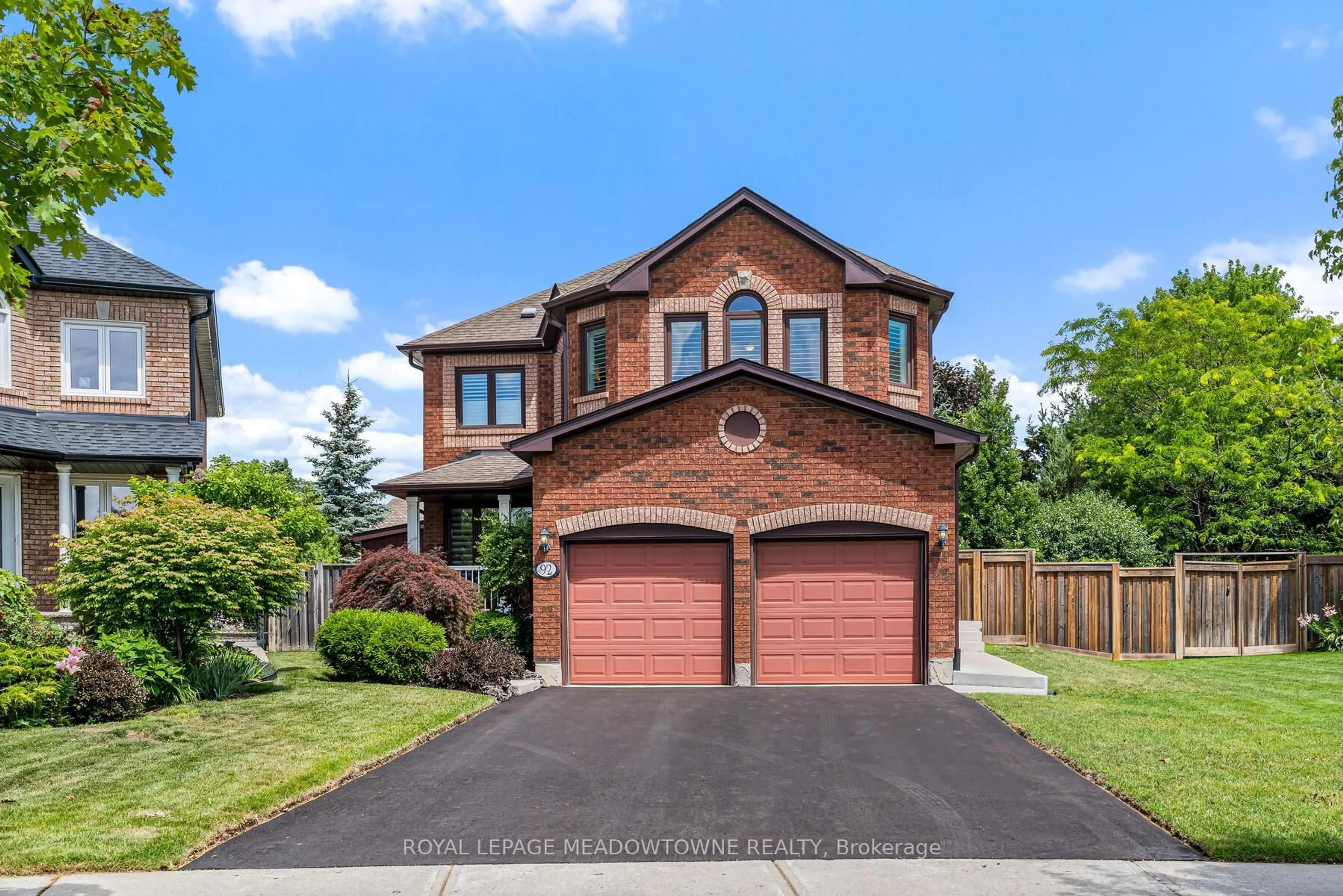 Home with brick exterior material, street for 92 LAUCHLIN Cres, Halton Hills Ontario L7G 5R5