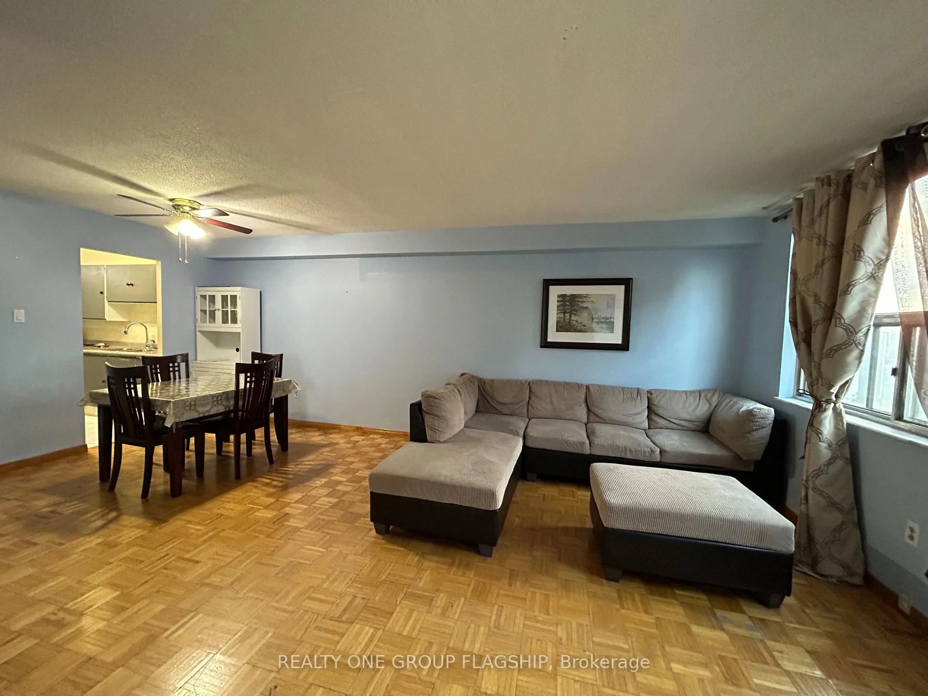 Living room with furniture, unknown for 10 Tobermory Dr #1205, Toronto Ontario M3N 2Y5