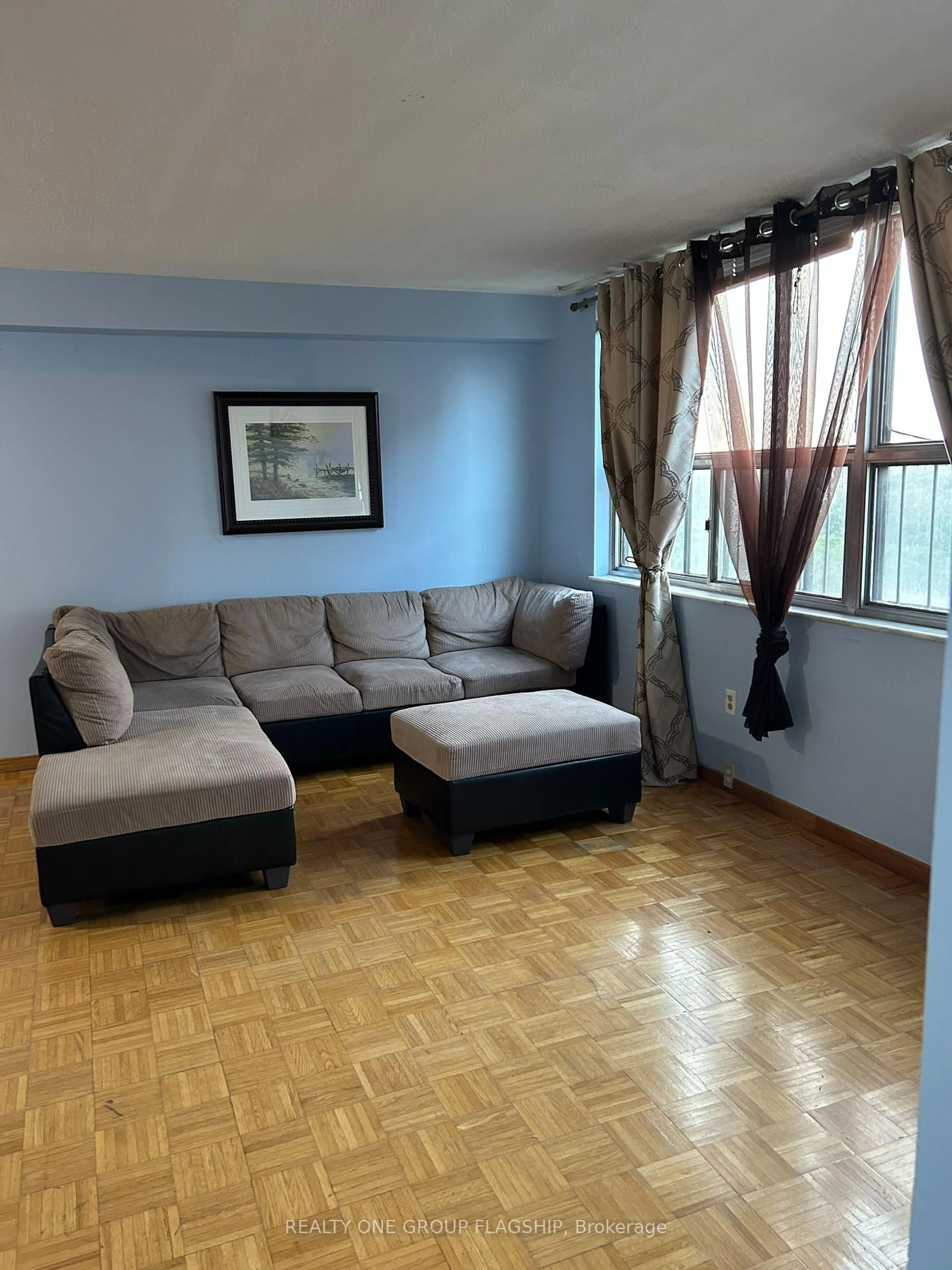 Living room with furniture, unknown for 10 Tobermory Dr #1205, Toronto Ontario M3N 2Y5