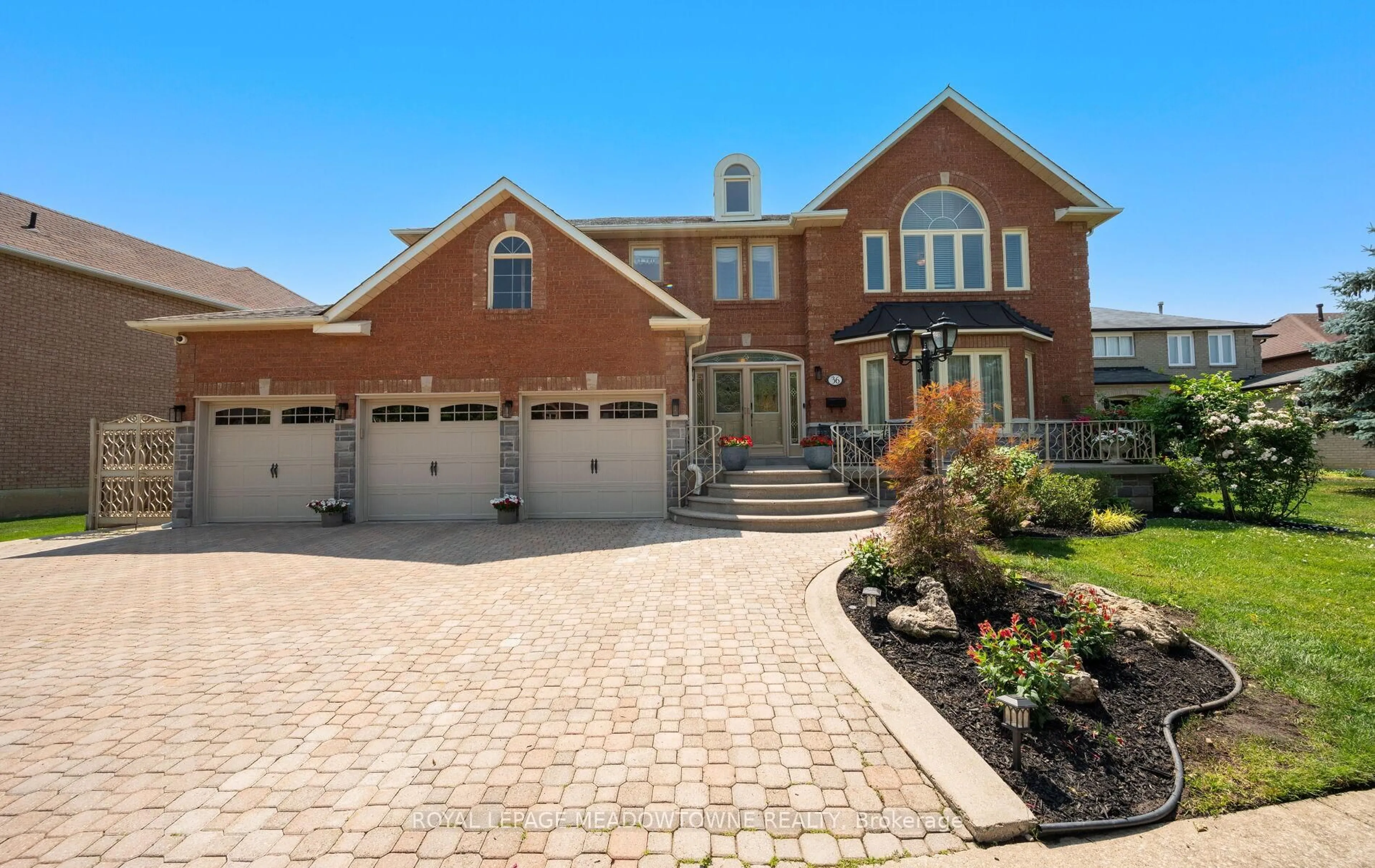 Home with brick exterior material, street for 36 Shadywood Rd, Brampton Ontario L6Z 4M1