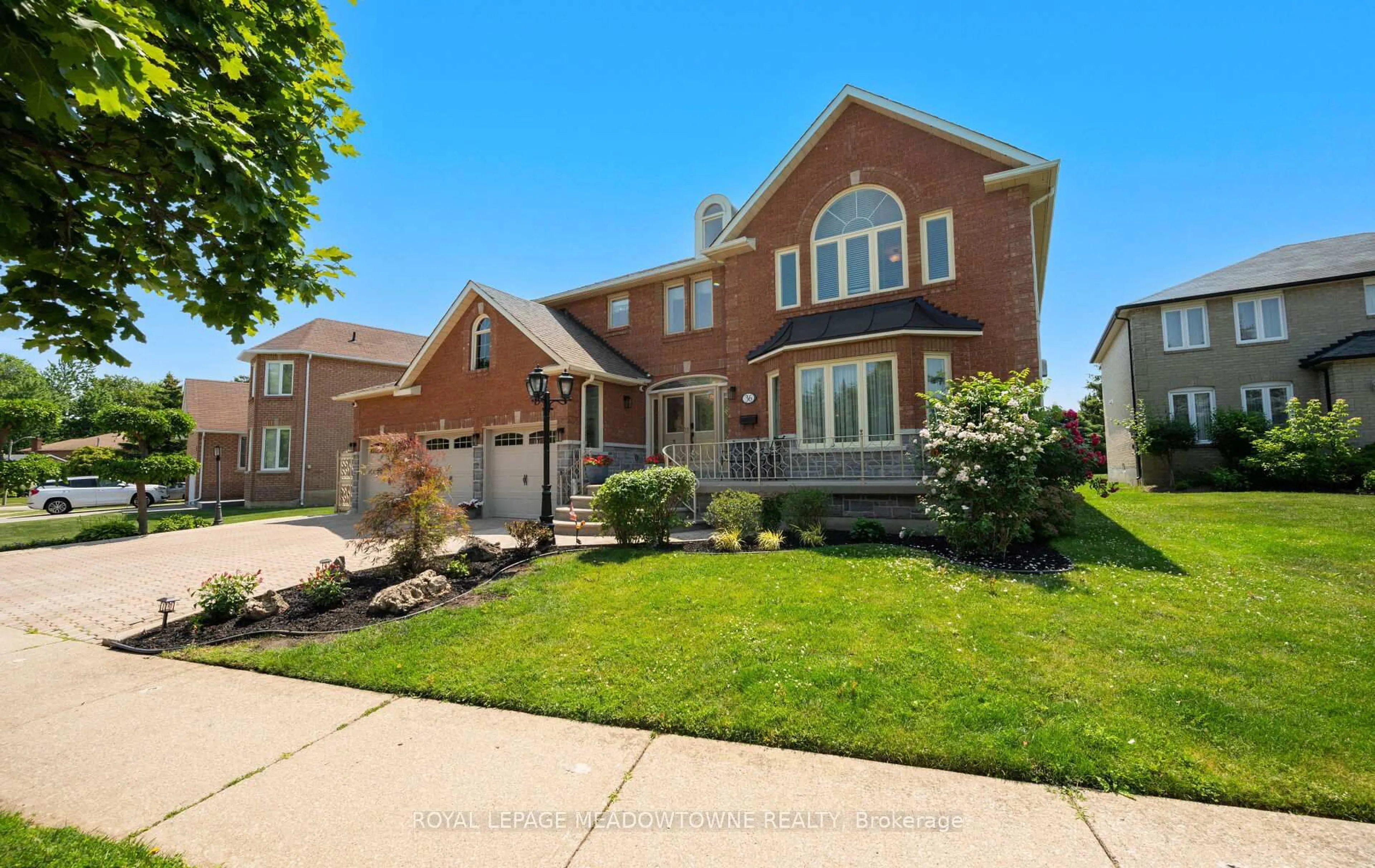 Home with brick exterior material, street for 36 Shadywood Rd, Brampton Ontario L6Z 4M1