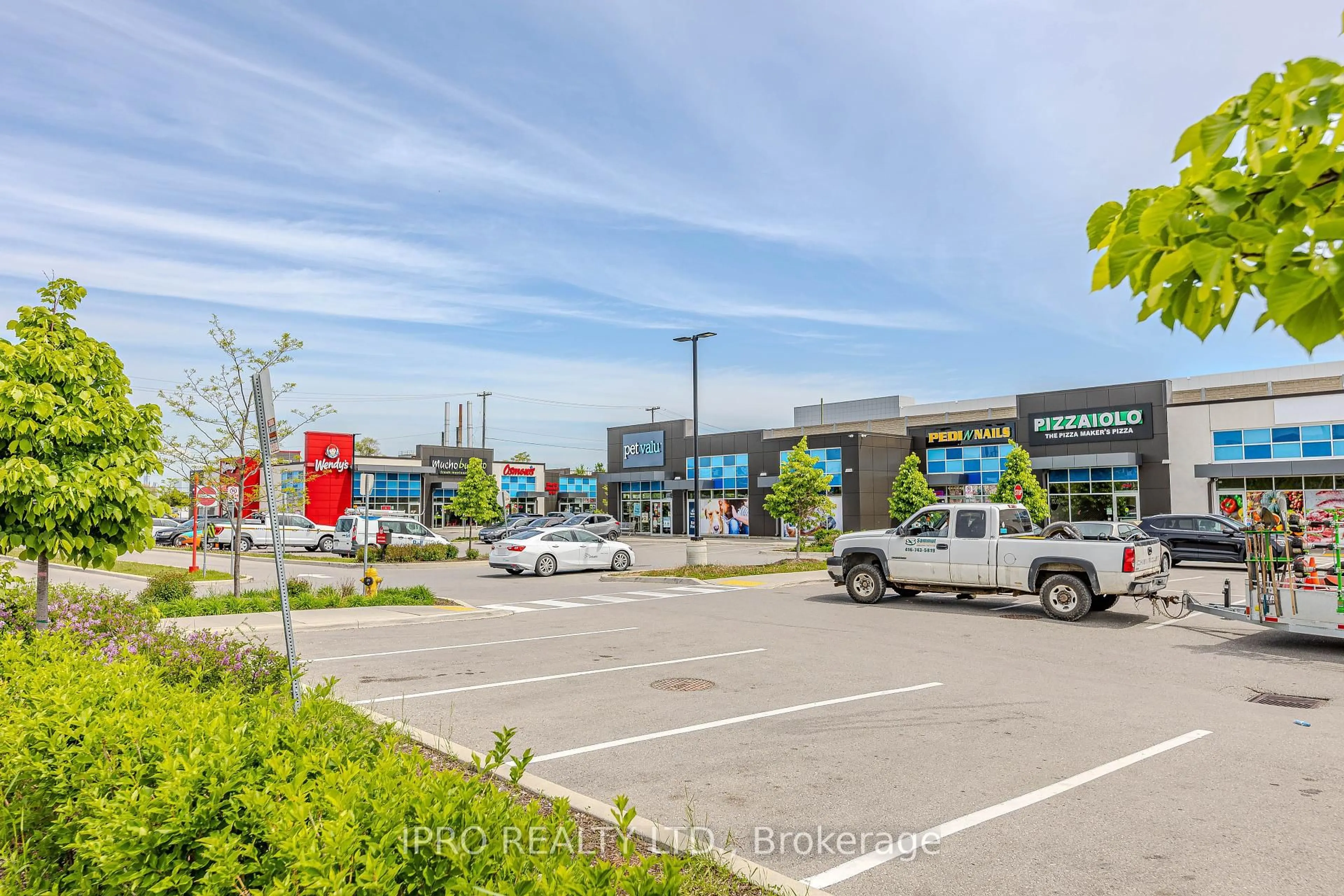 A pic from outside/outdoor area/front of a property/back of a property/a pic from drone, street for 149 Isaac Devins Blvd #5, Toronto Ontario M9M 0C5