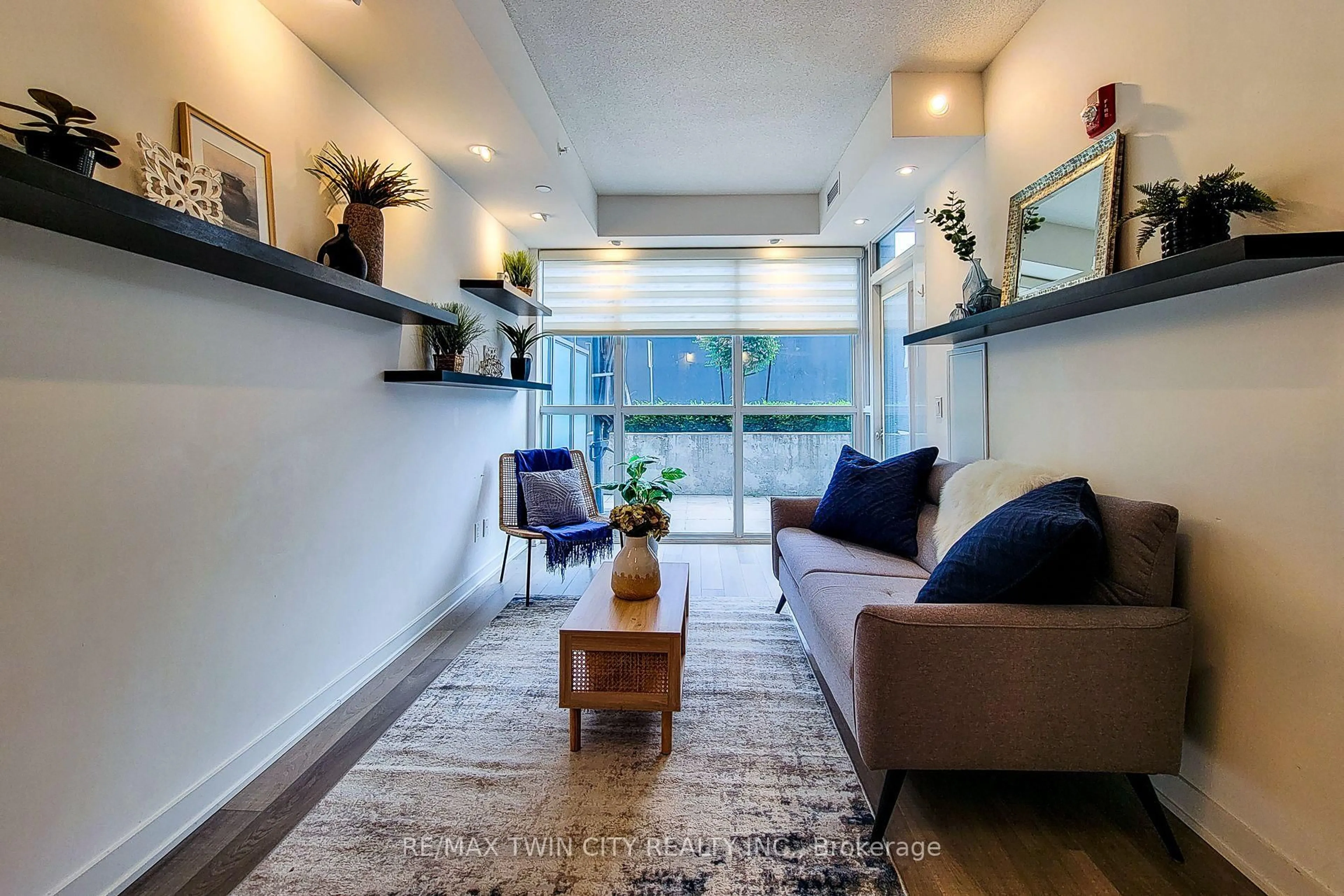 Living room with furniture, unknown for 5240 Dundas St #215, Burlington Ontario L7L 0J6