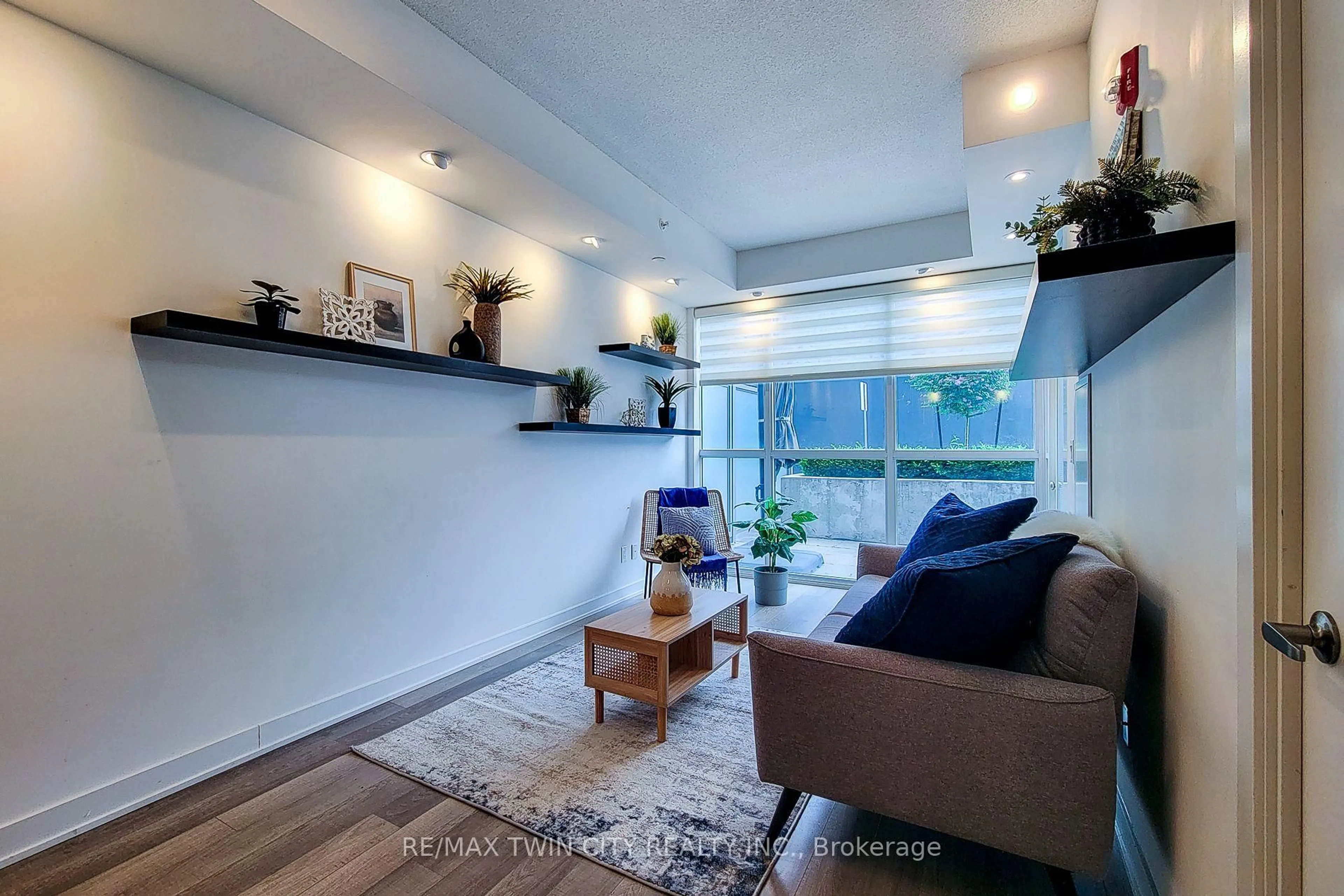 Living room with furniture, unknown for 5240 Dundas St #215, Burlington Ontario L7L 0J6